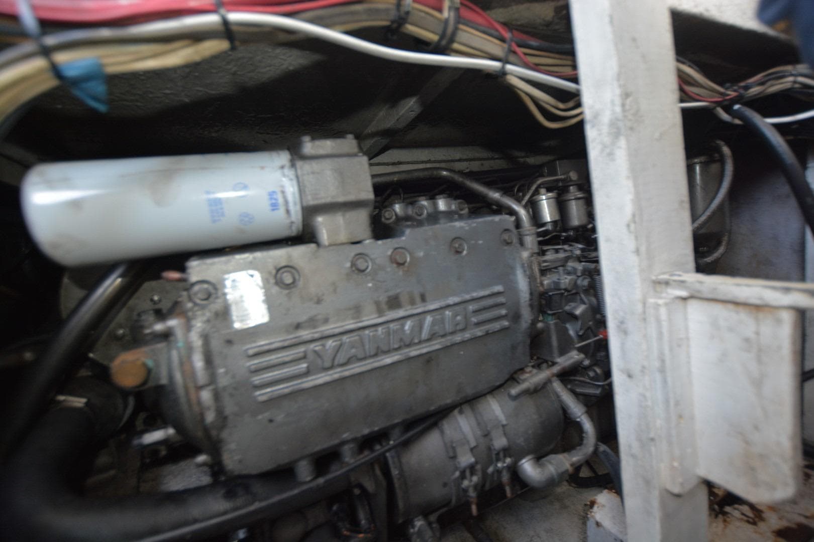 Engine compartment of 1983 Key West #1 Sport Fish boat, featuring Yanmar engine.