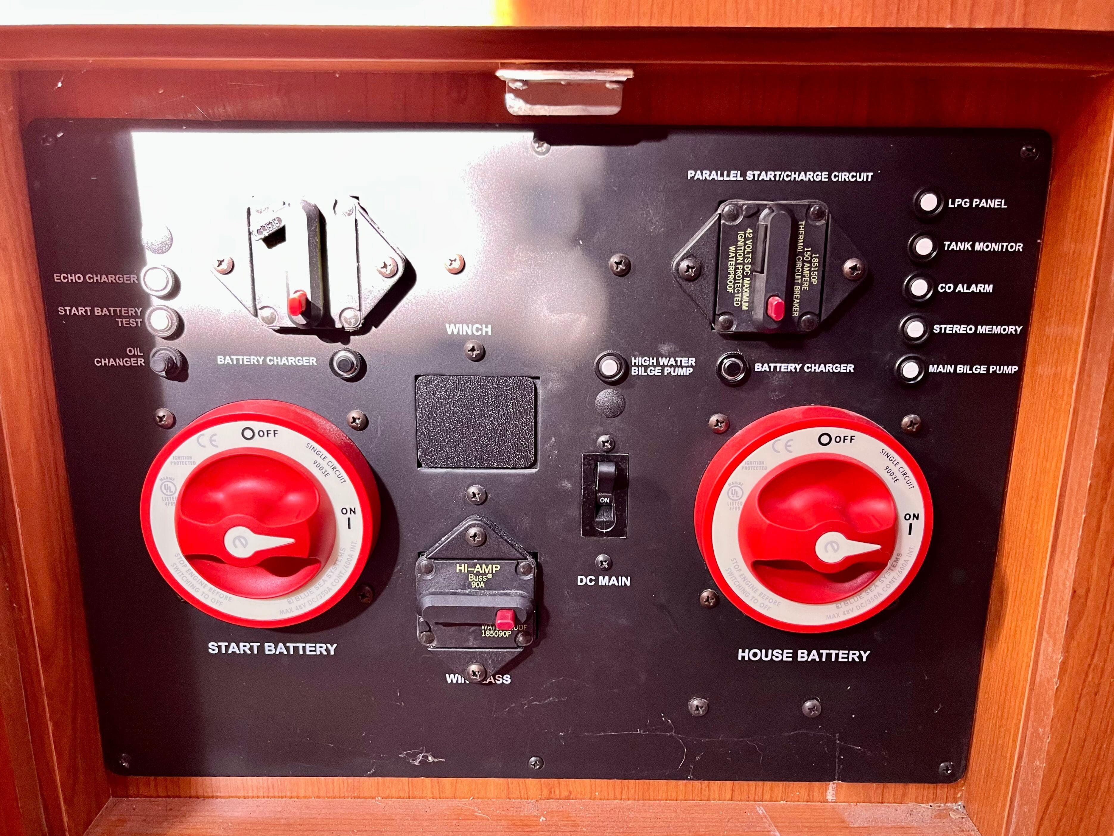 Control panel of a 2008 Hunter 38 sailboat with battery switches and indicators.