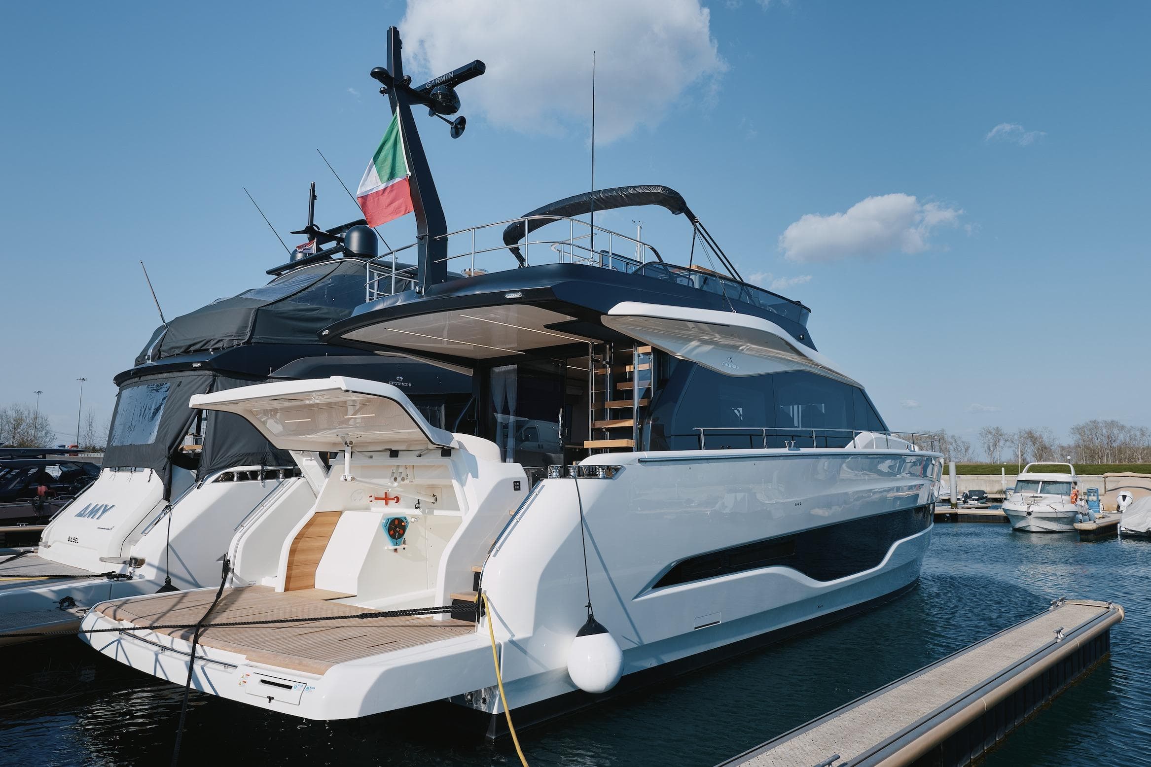 Luxury yacht Cranchi Sessantadue 62, 2026 model, docked at marina.