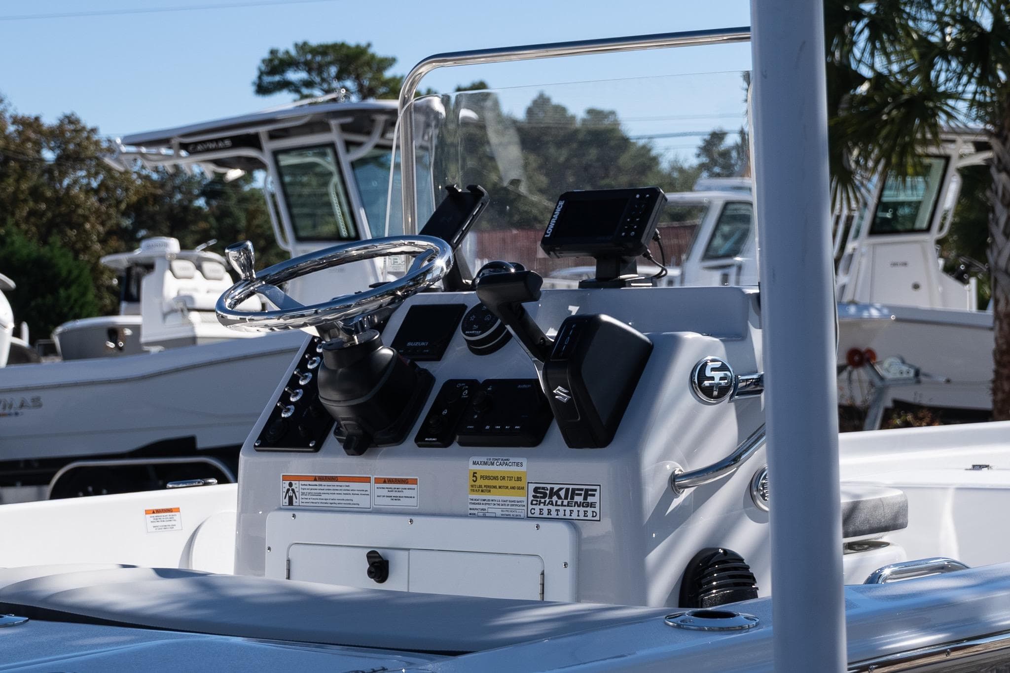 2026 Sea Pro 172 Bay boat console with steering wheel and navigation equipment.