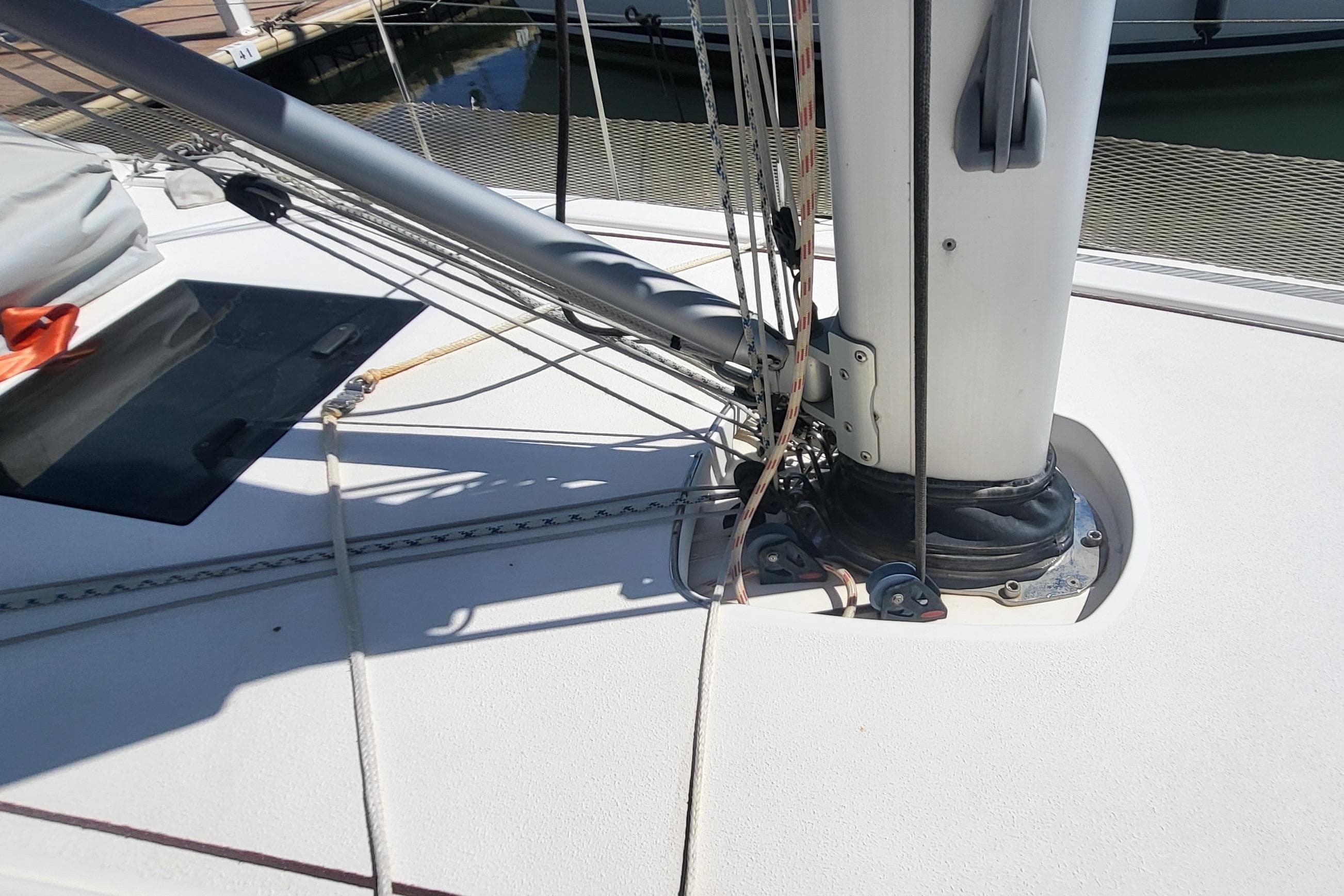 Deck of 2016 X-Yachts Xp 38 sailboat with mast and rigging details.