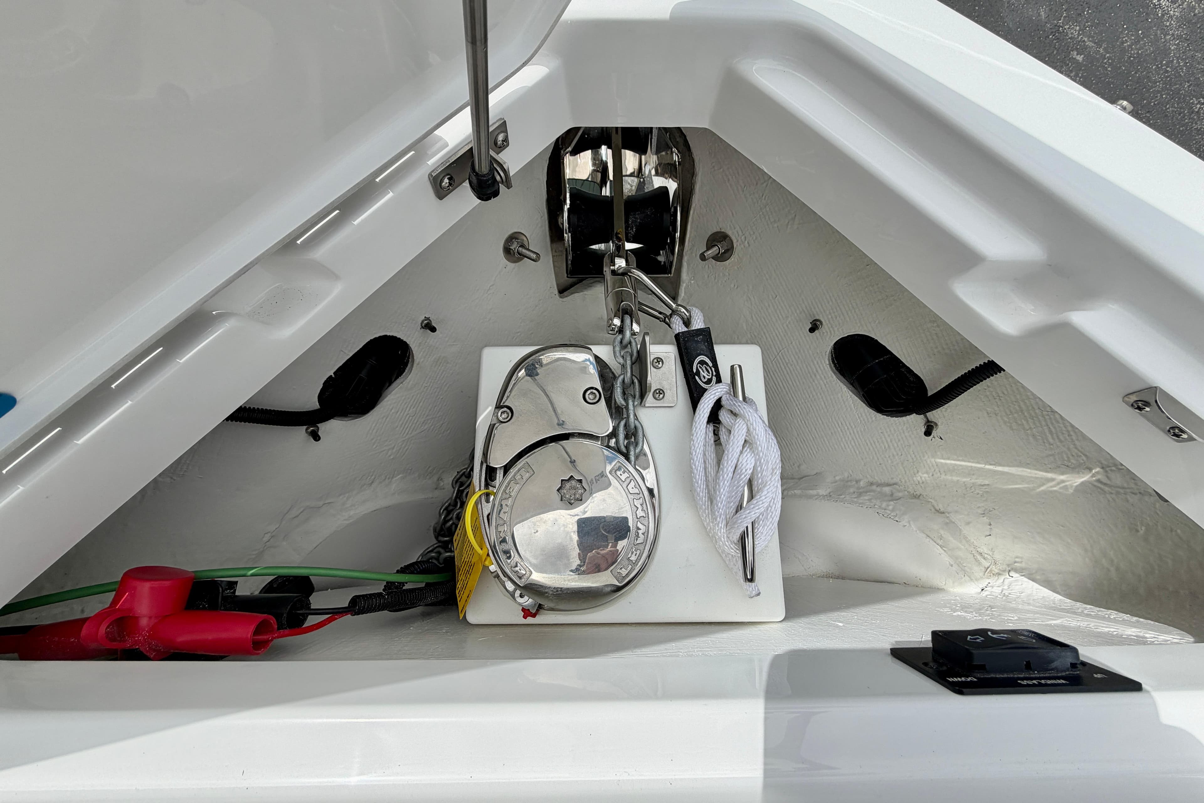 Anchor compartment of 2026 Cobalt R8 Outboard boat with winch and ropes.