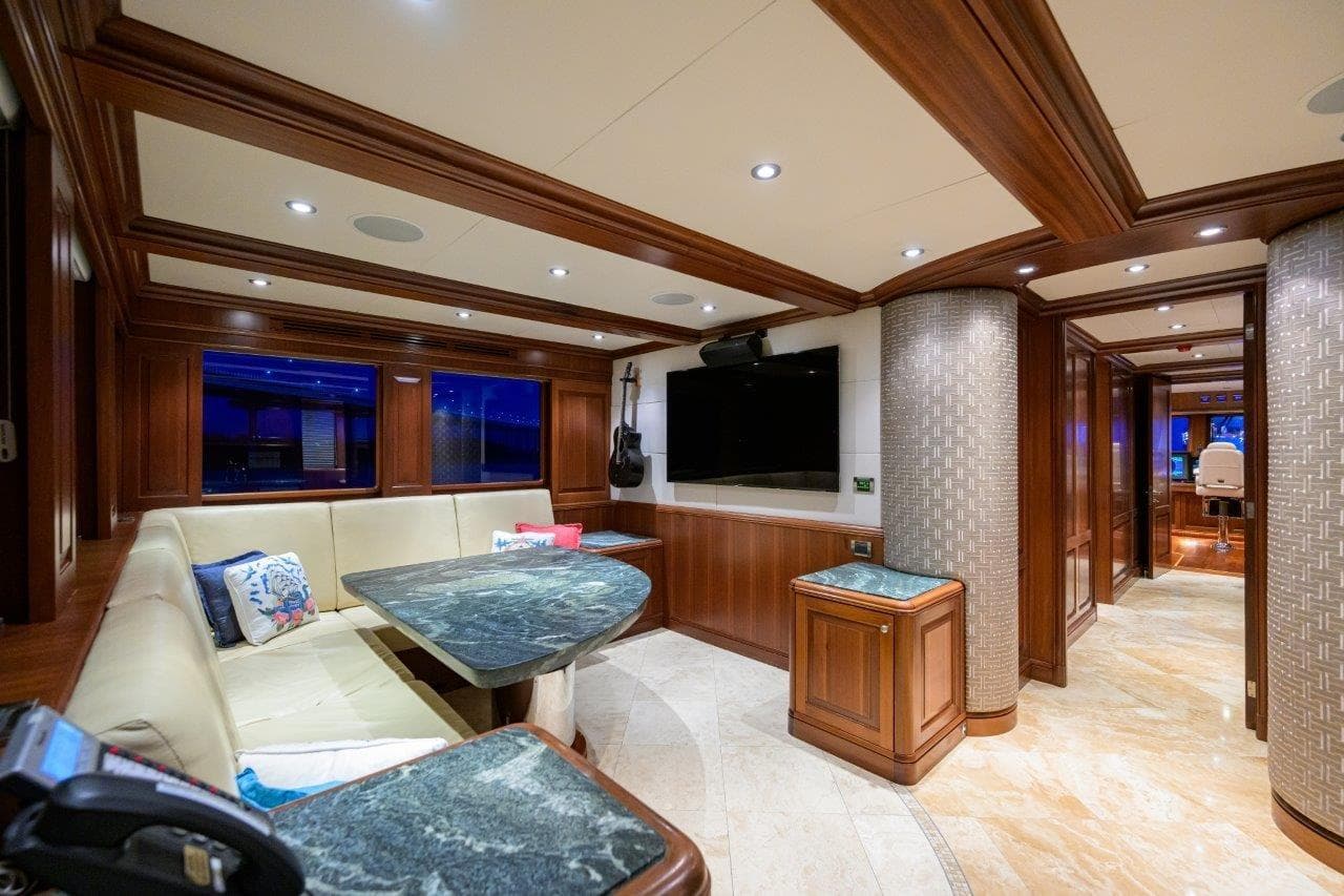 Luxurious interior of 2011 C & G Boatworks Explorer yacht with elegant wood finishes.