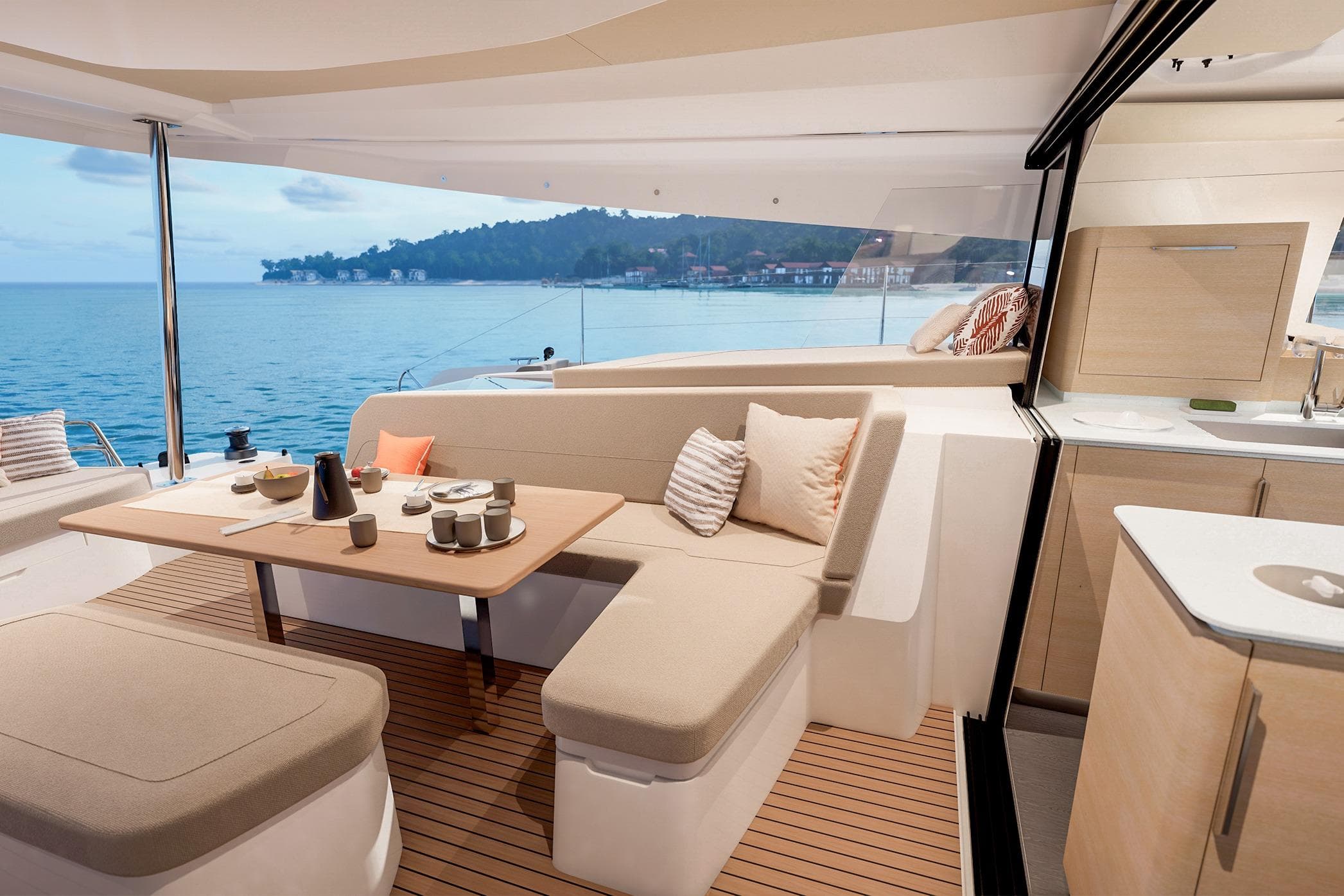 Luxurious 2026 Fountaine Pajot FP 48 yacht interior with elegant dining area and ocean view.