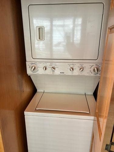 Stacked washer and dryer in 2005 Sumerset 90x18 houseboat.