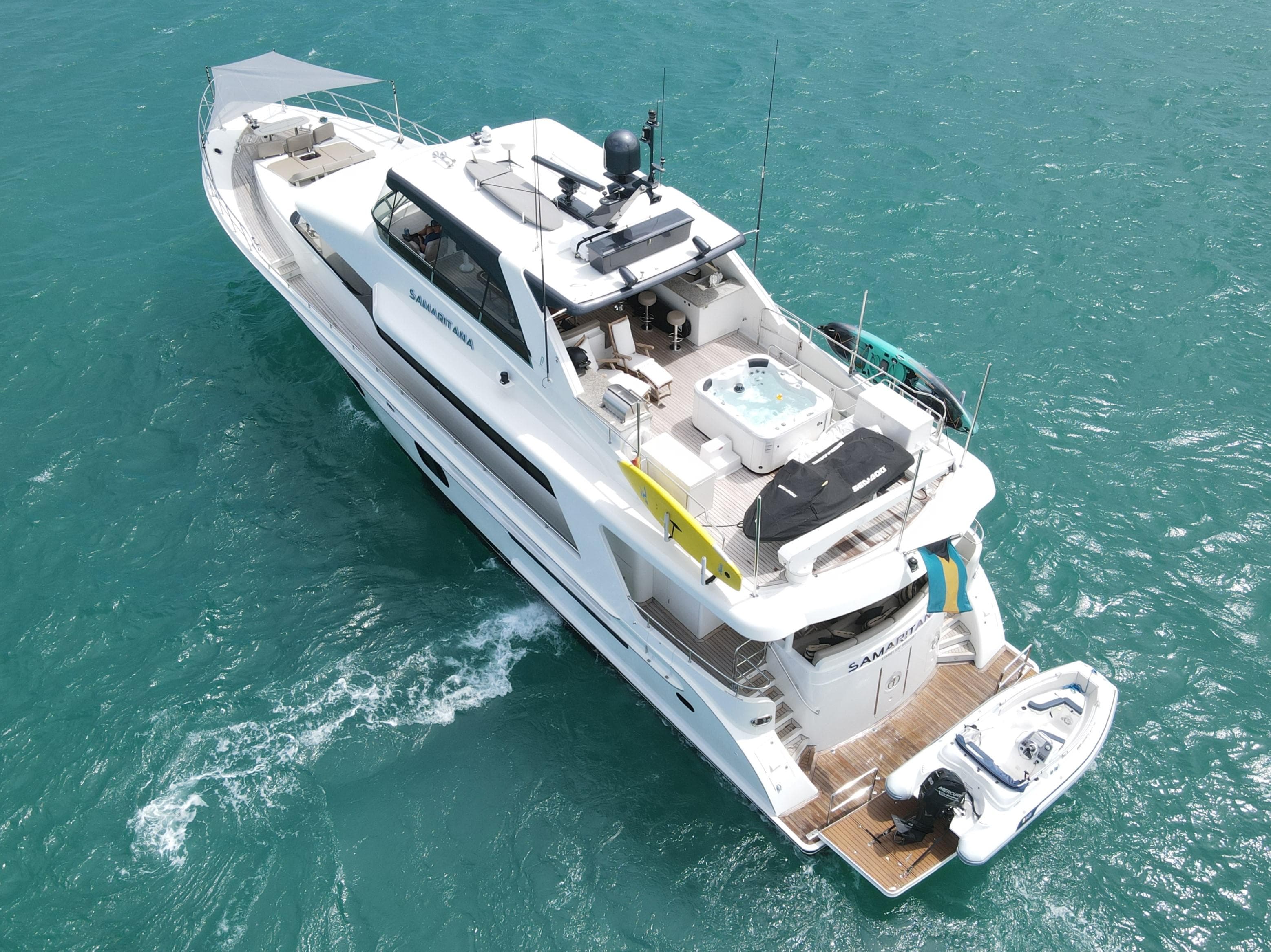 Luxury 2013 Cheoy Lee Bravo yacht cruising on turquoise waters.