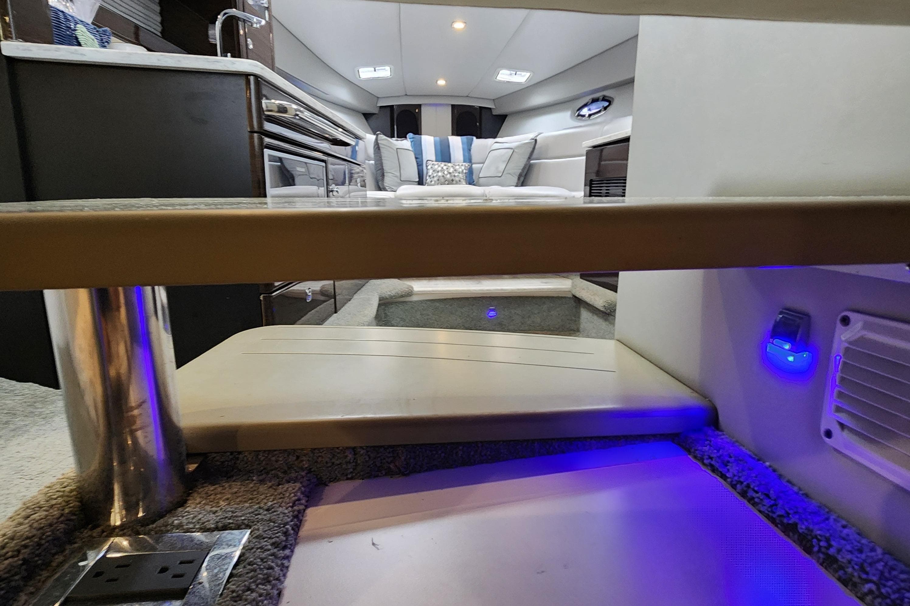 Interior of 2017 Formula 370 Super Sport yacht, featuring modern design and ambient lighting.