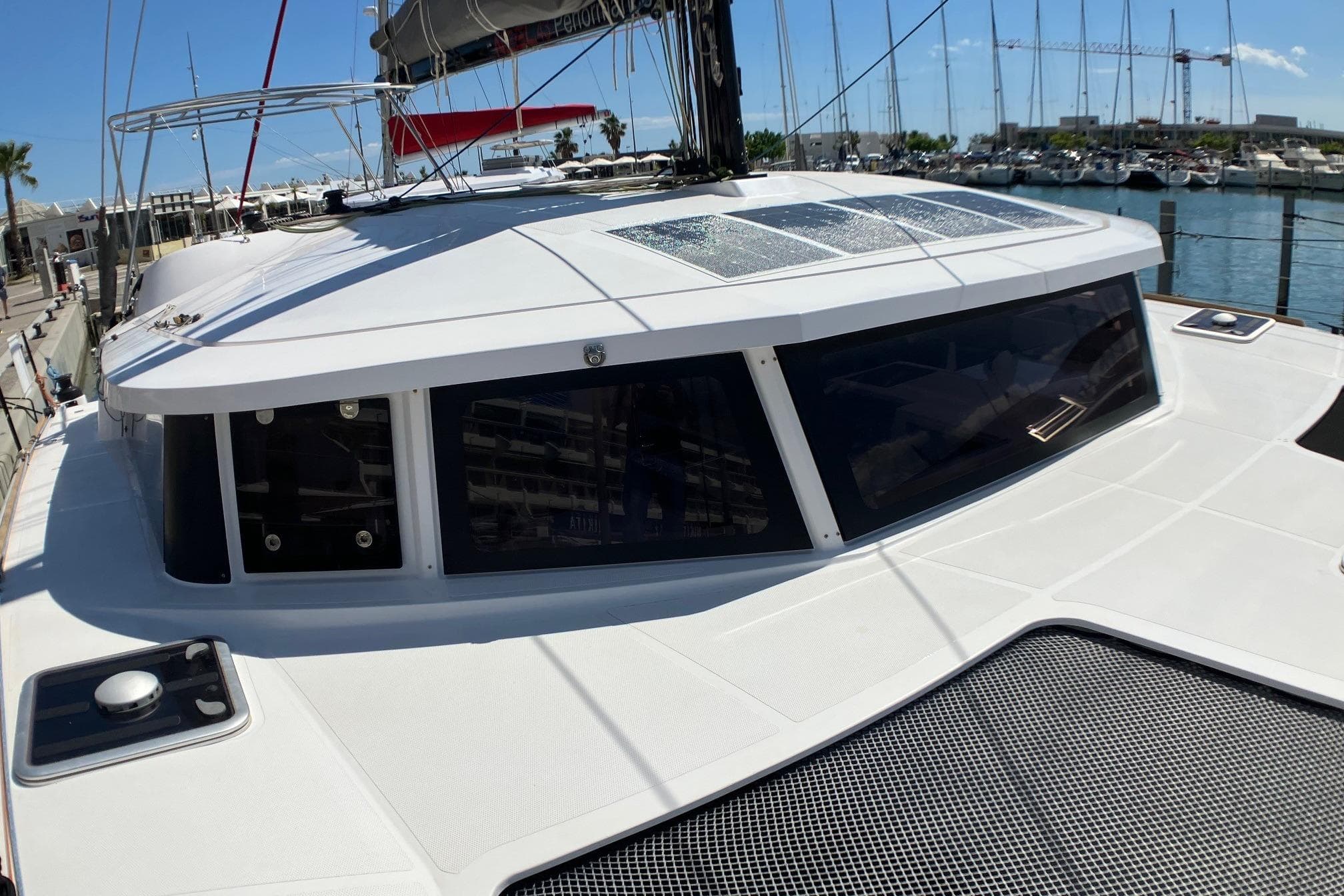 2024 NEEL 43 trimaran with sleek design docked at marina.