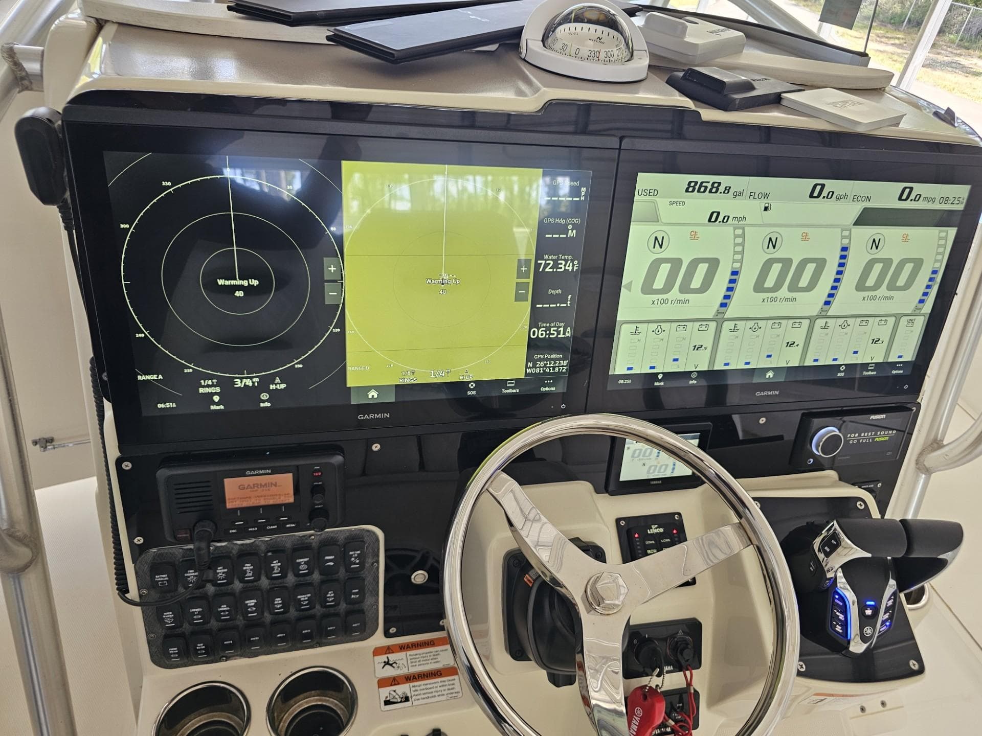 2004 Hydra-Sports 33 Vector boat dashboard with navigation screens and controls.