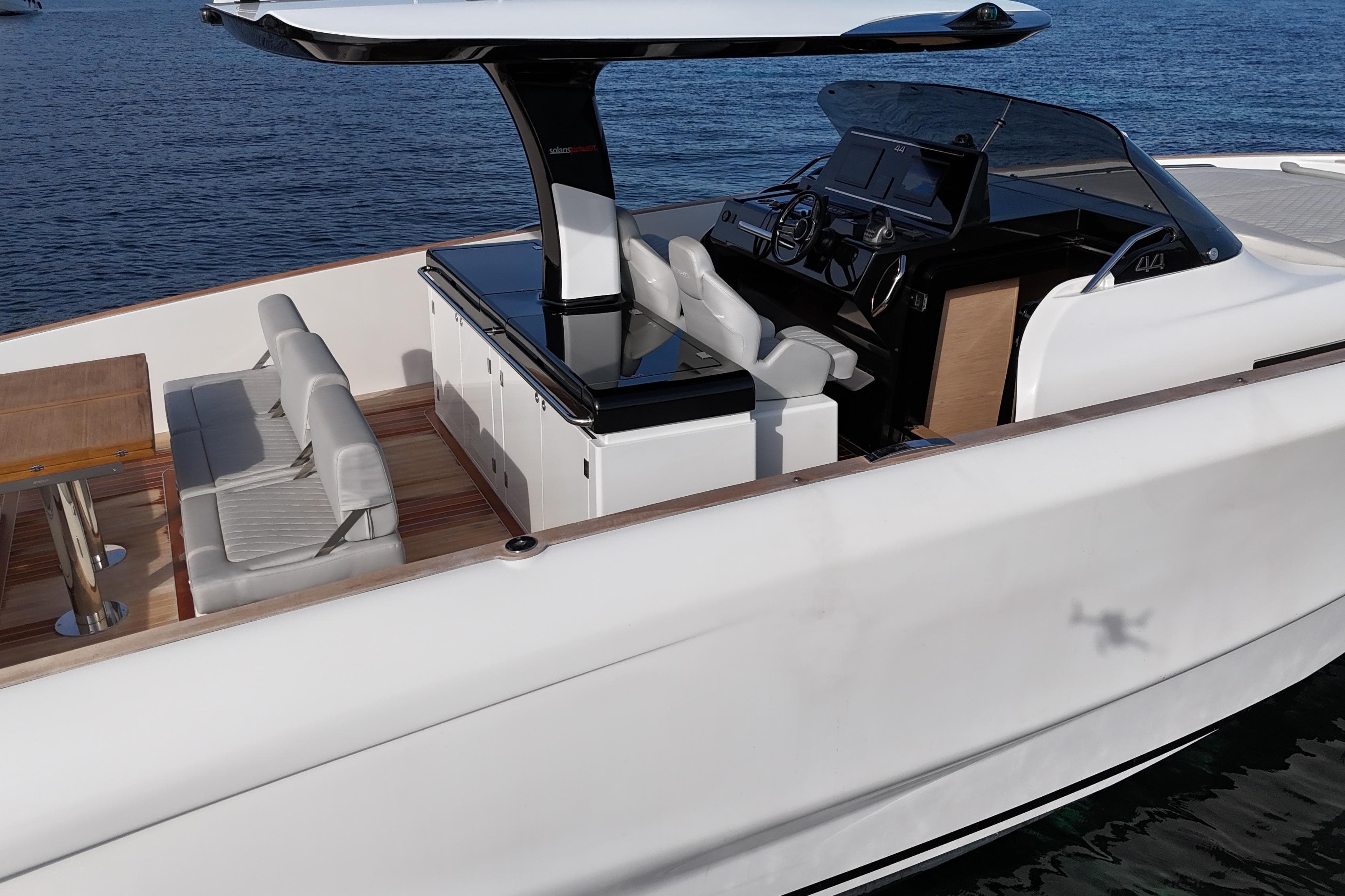 2024 Solaris 44 yacht with sleek design, modern cockpit, and luxurious seating on open water.