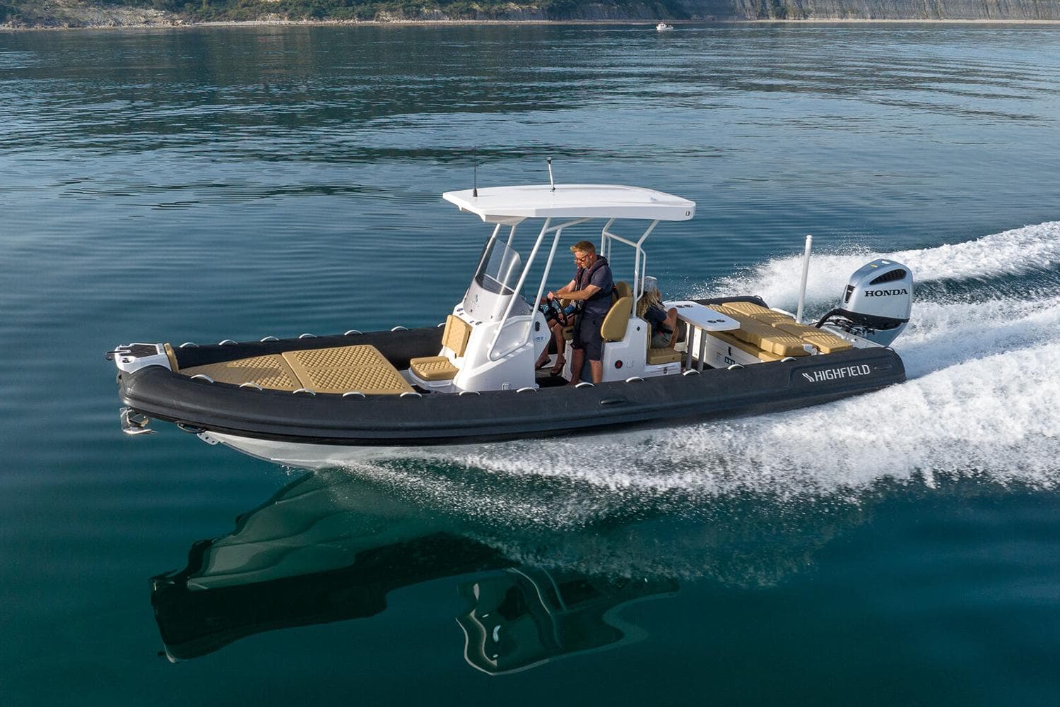 Manufacturer Provided Image: 2025 Highfield Sport 800 boat cruising on calm water.