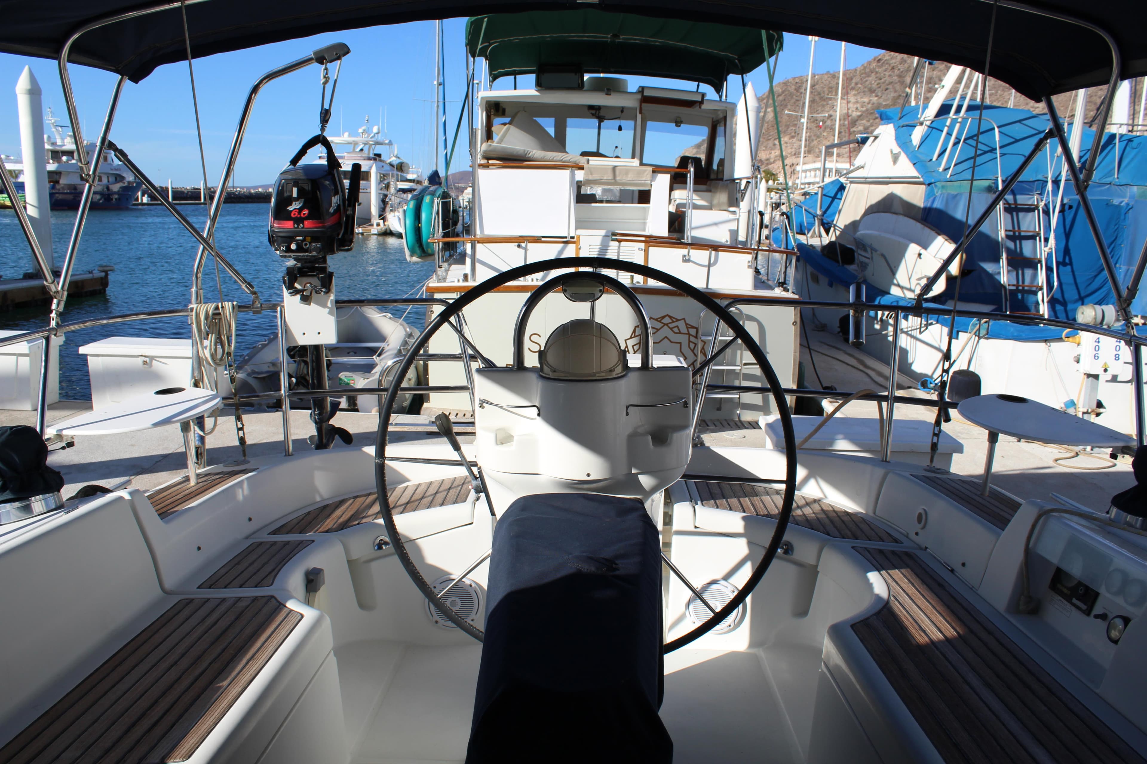 Cockpit view of 2004 Beneteau Oceanis Clipper 423 yacht docked at marina.
