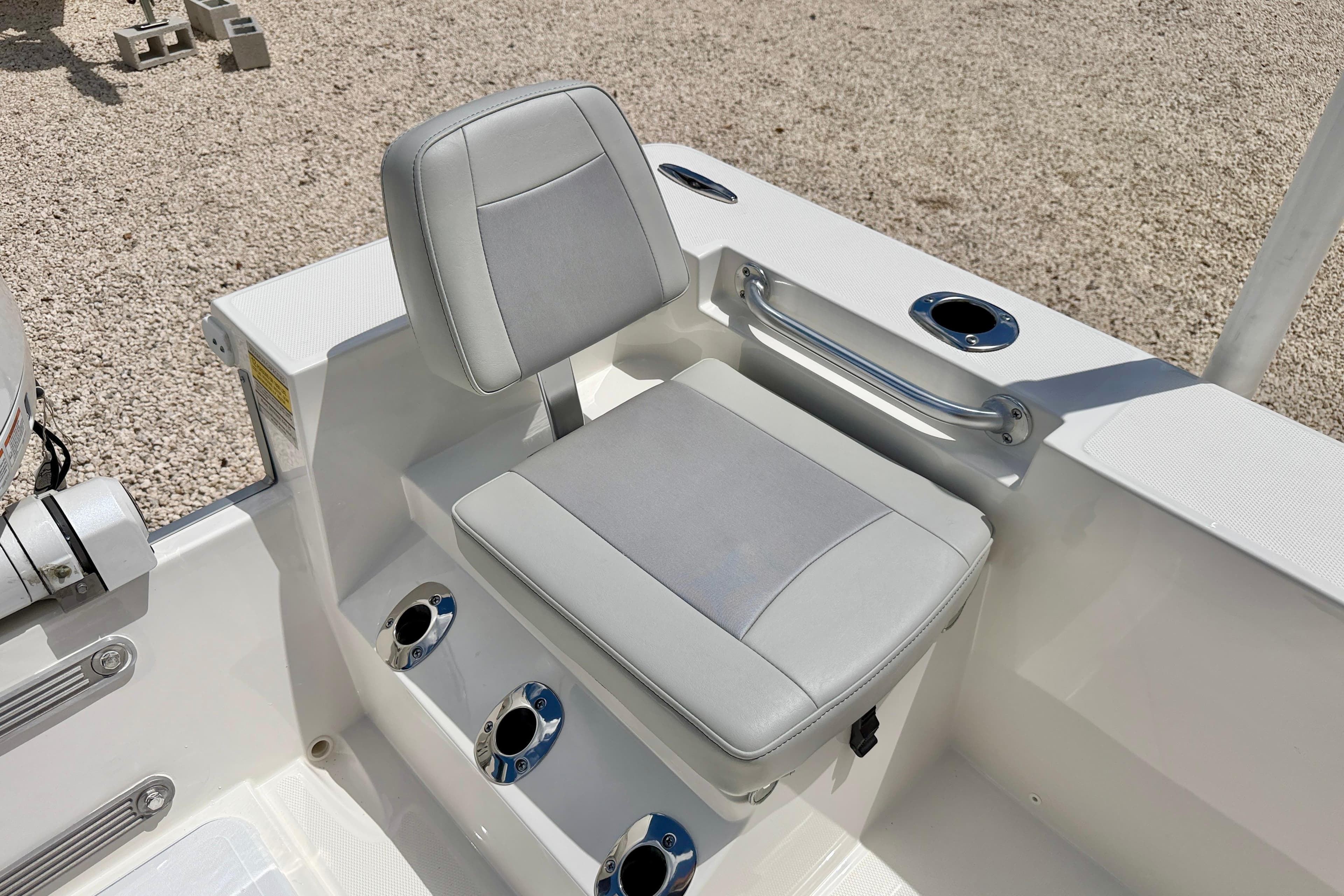 Bay Rider 2260 FS Skiff 2027 boat seat with cup holders and grab rail.