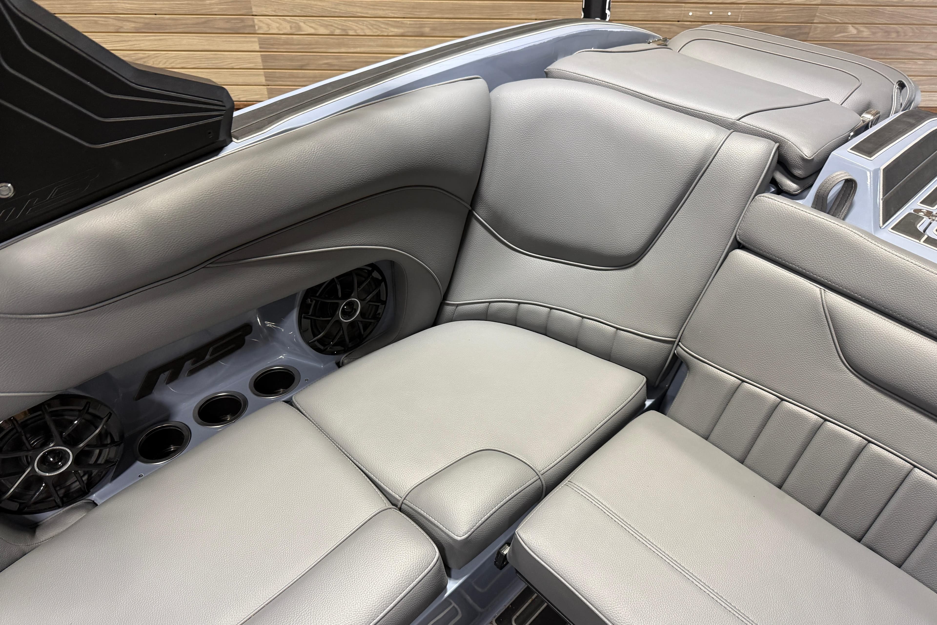 Luxurious interior of 2026 MB B52 23 Alpha boat with sleek gray seating.