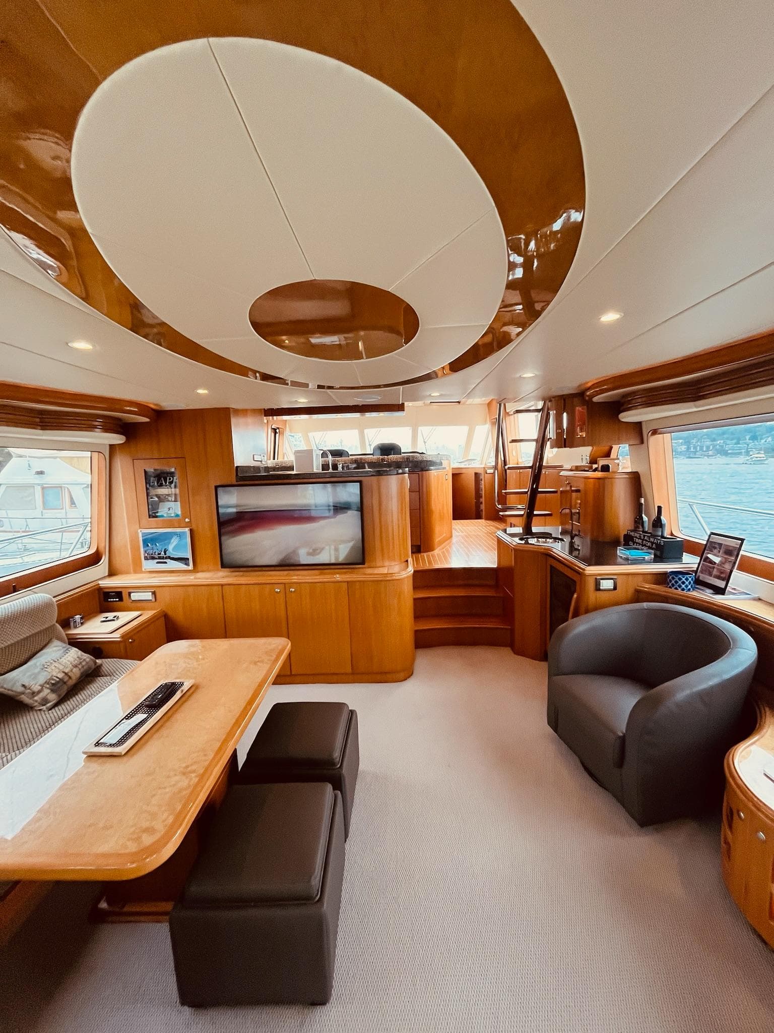 Luxurious interior of 2007 Regency Yachts 670 Pilothouse with elegant wood finishes.