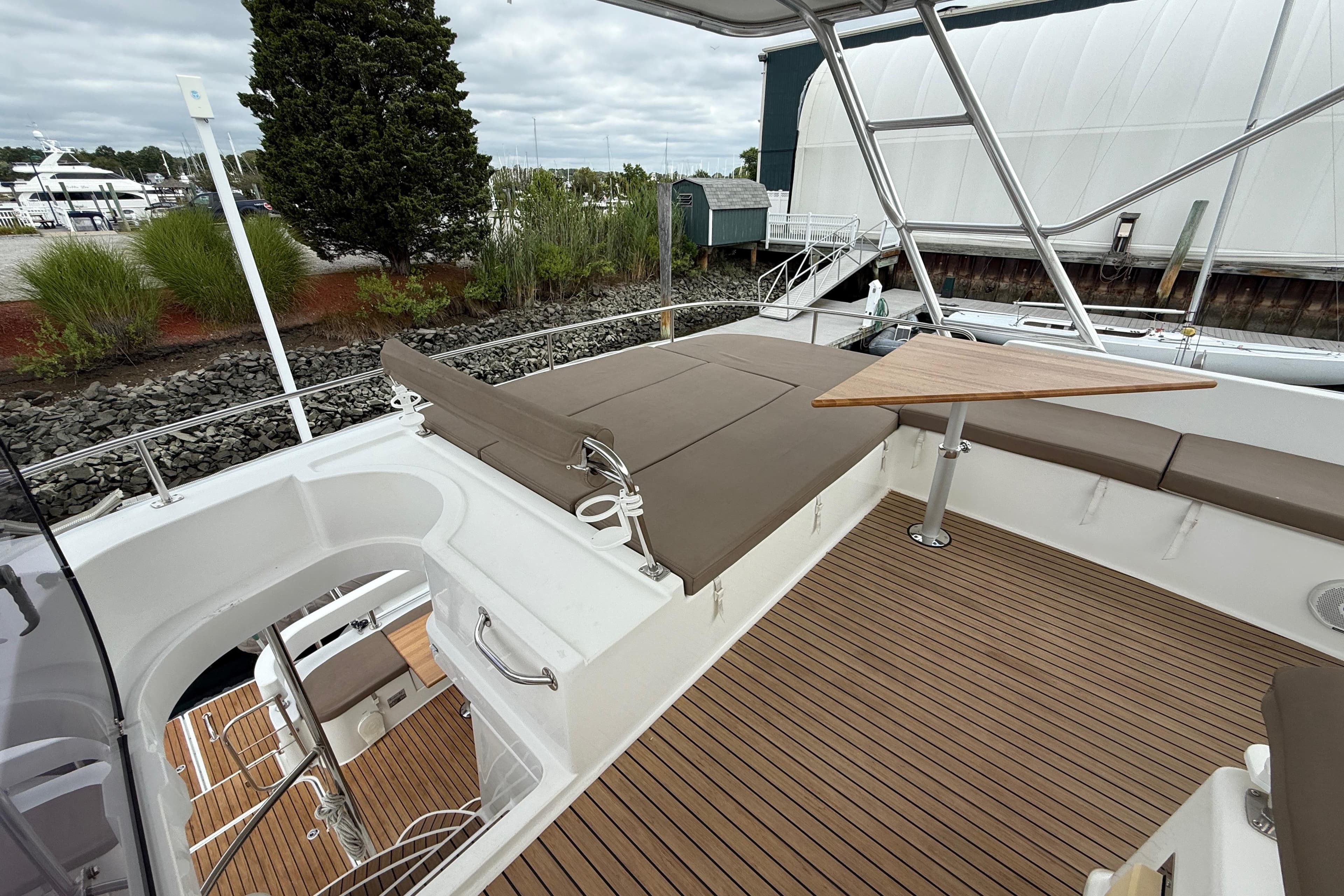 2015 Fountaine Pajot Summerland 40 LC yacht deck with seating and table.