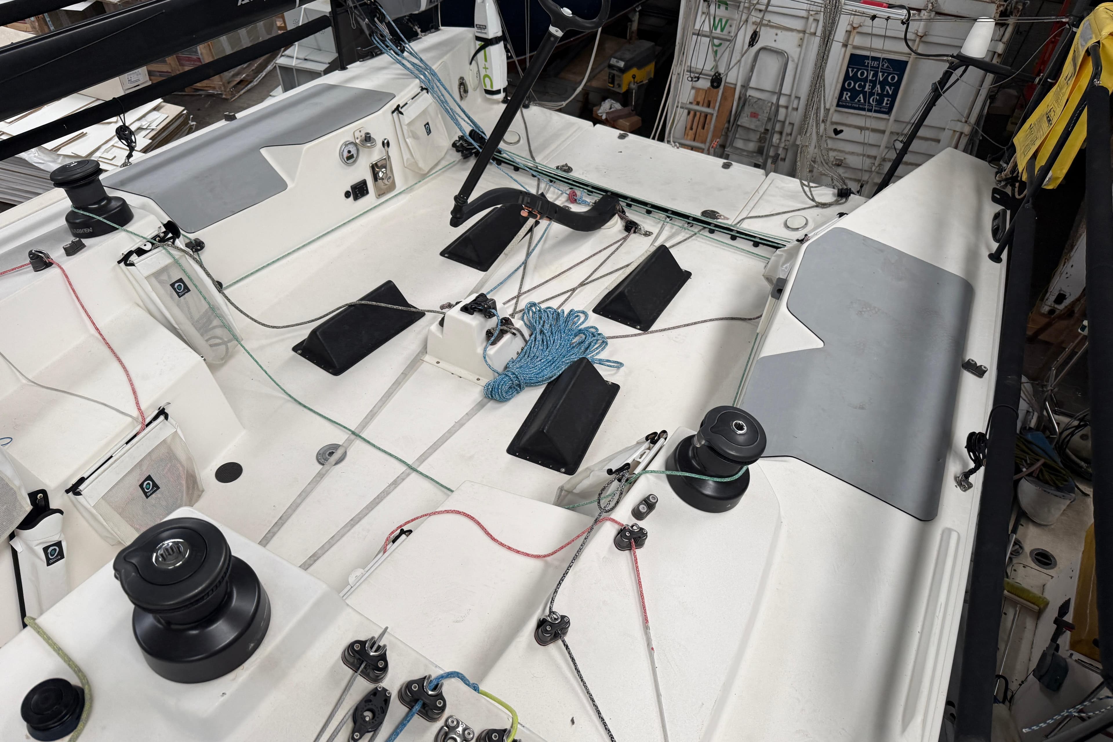 Cockpit of a 2019 JPK 1030 sailboat with ropes and winches.