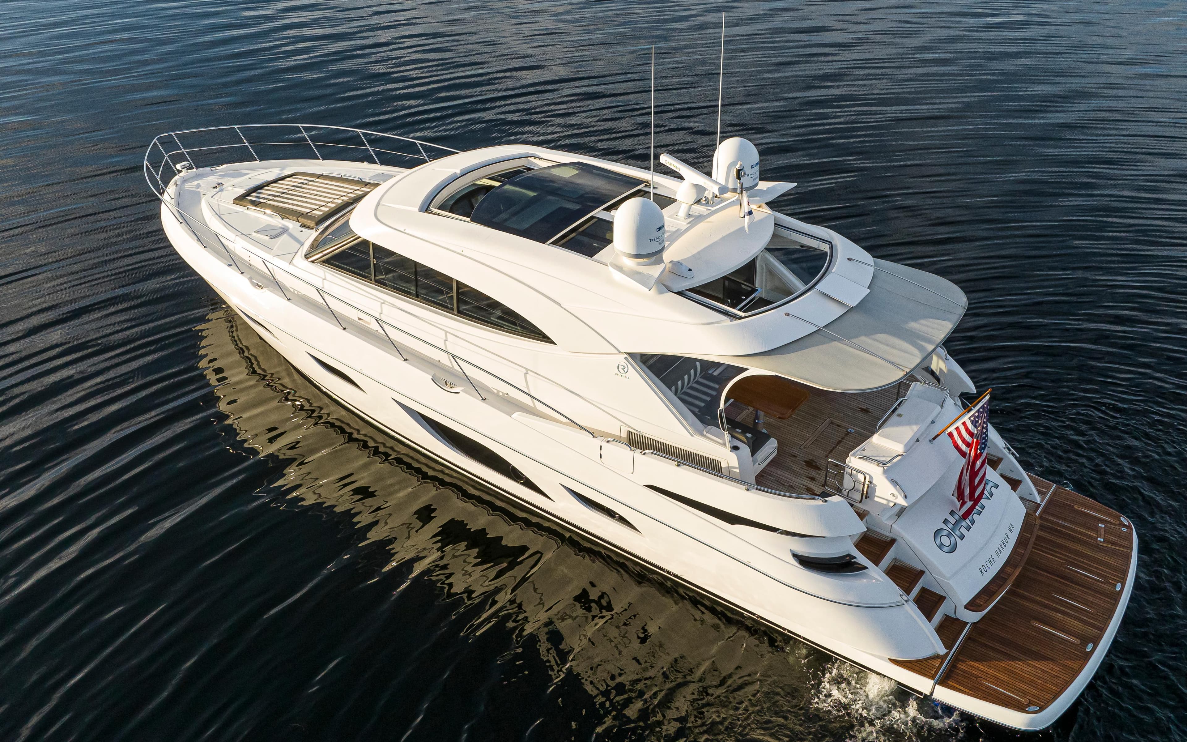 2017 Riviera Sport Cruiser yacht on calm water, aerial view.
