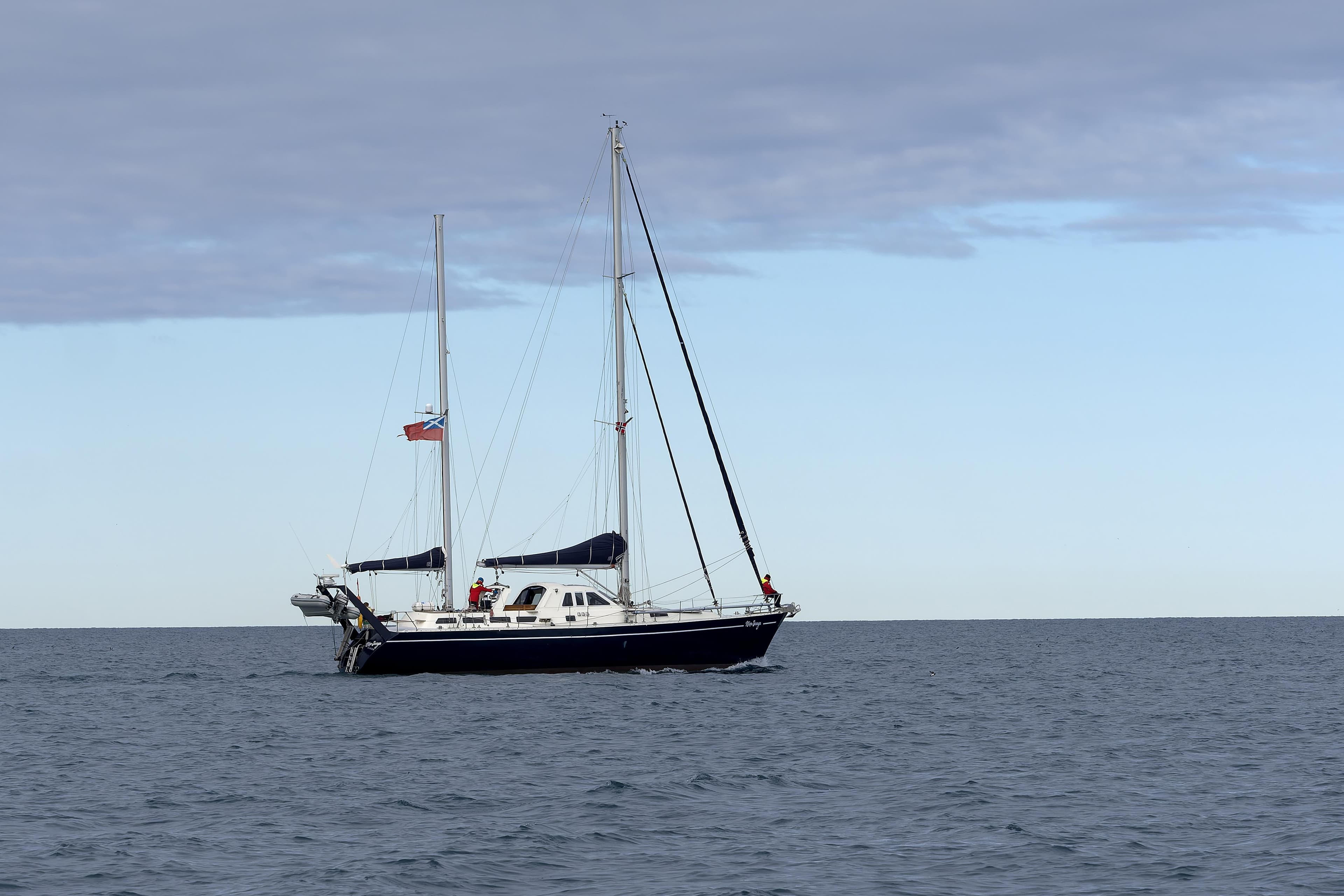 Sailing ketch on open sea, Custom Blue Water Explorer Adventure, 2008 model.