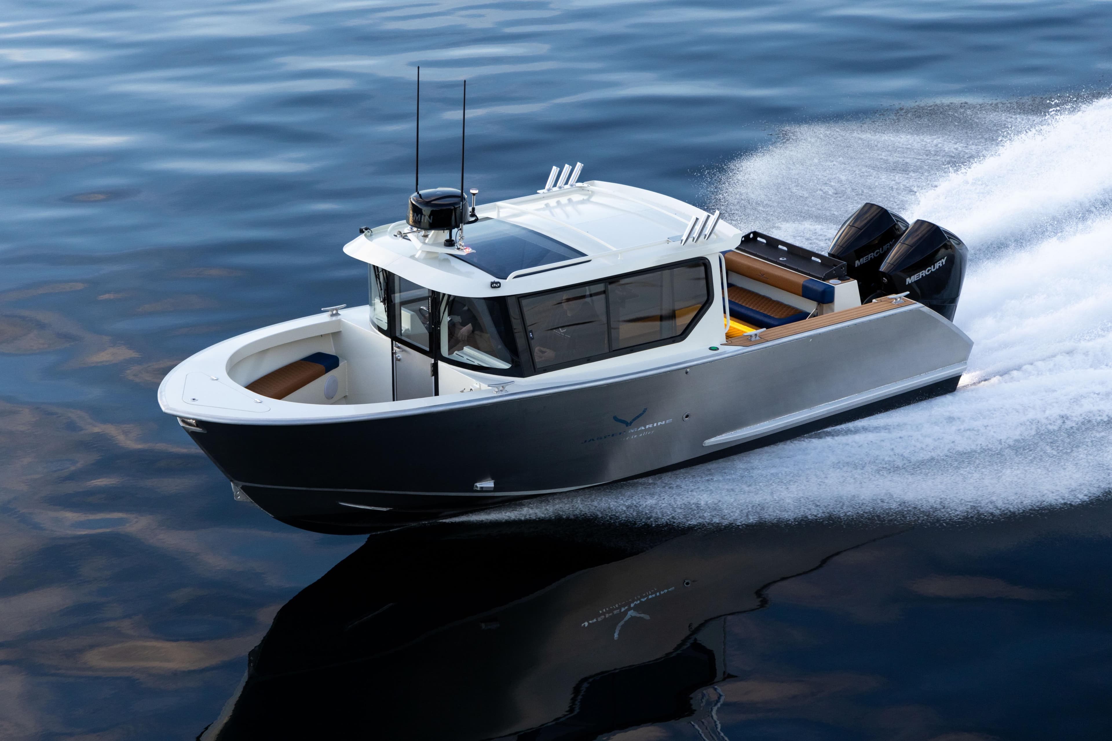 2026 Jasper Marine Defender 22 boat cruising on calm water.