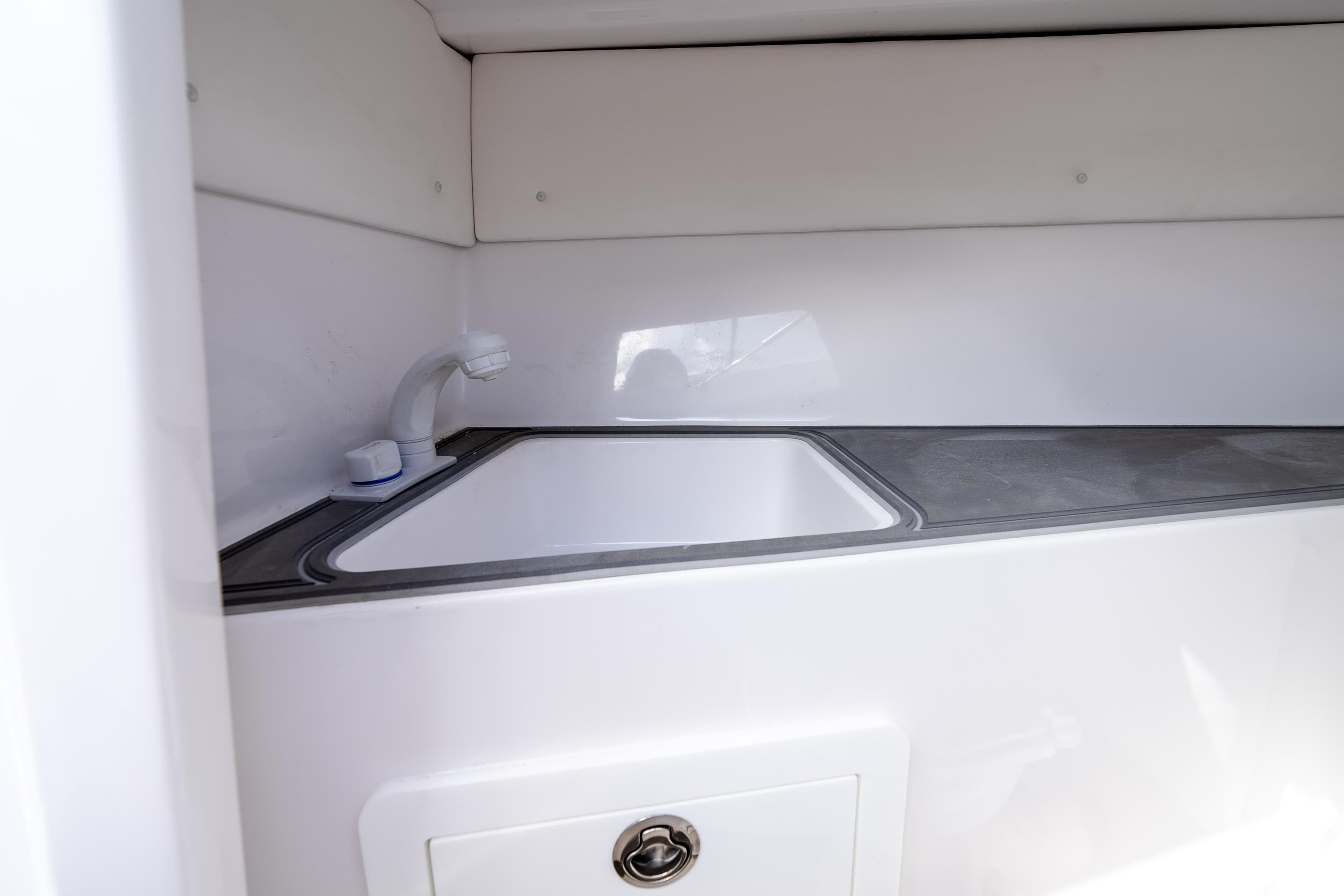 2024 Dynamic D-305V interior sink with modern faucet and sleek countertop design.