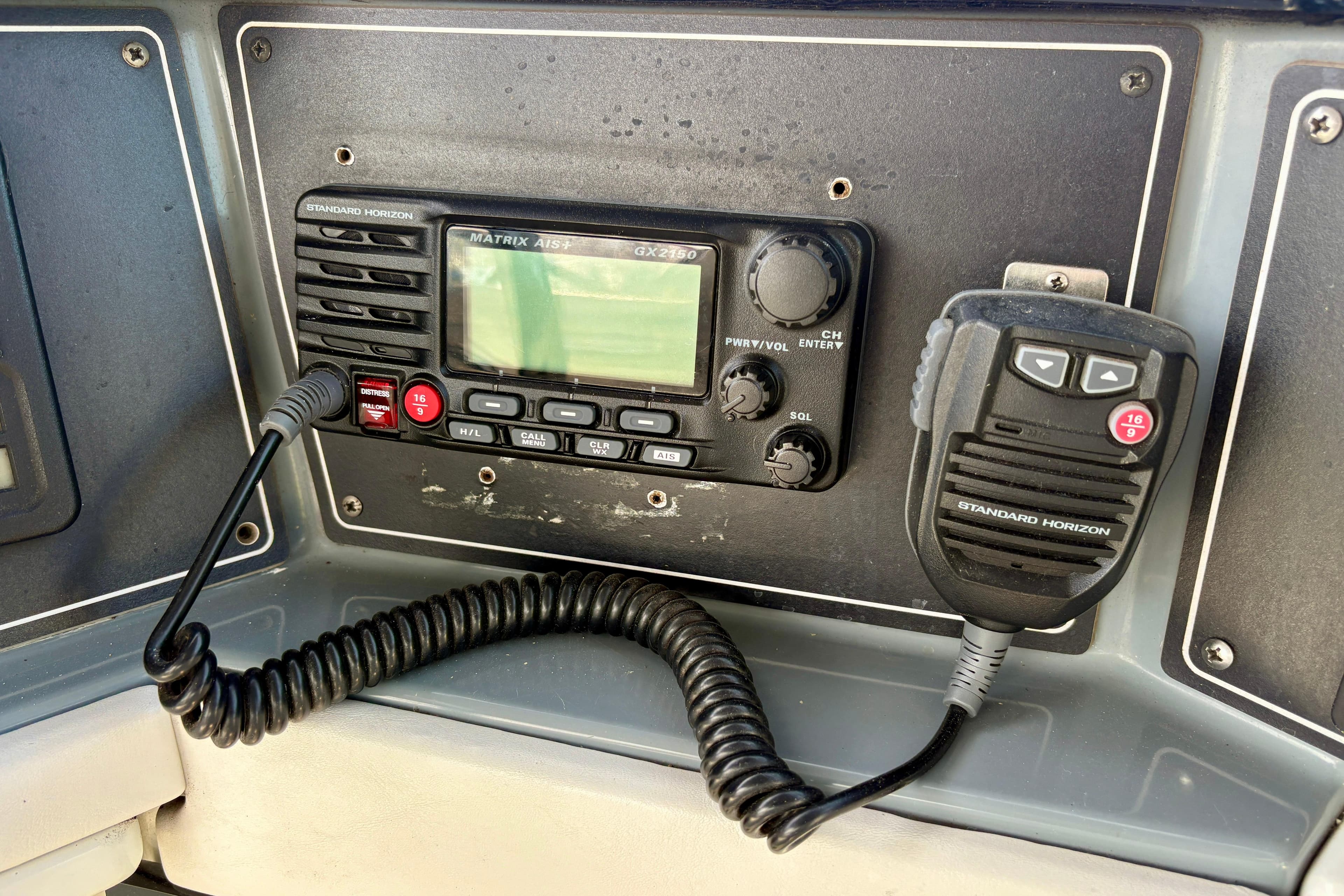 Standard Horizon radio system on 1989 Formula 35 PC boat dashboard.