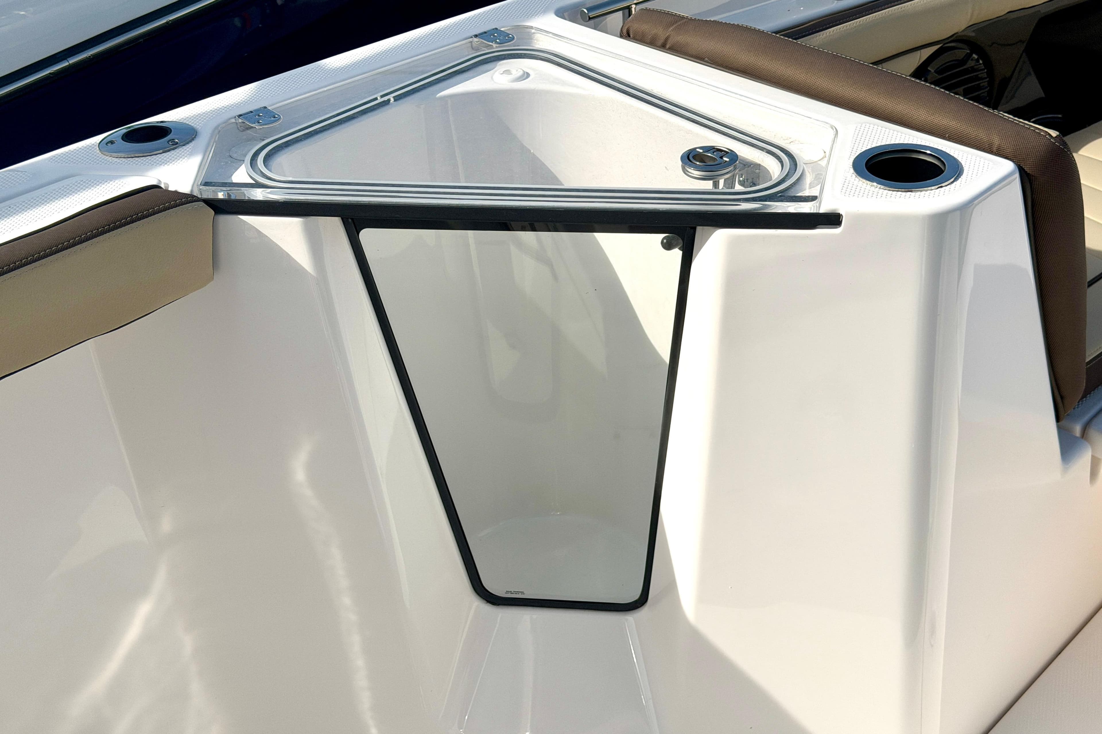 2026 Yamaha Boats 255 FSH Sport H interior detail with cup holders and seating.