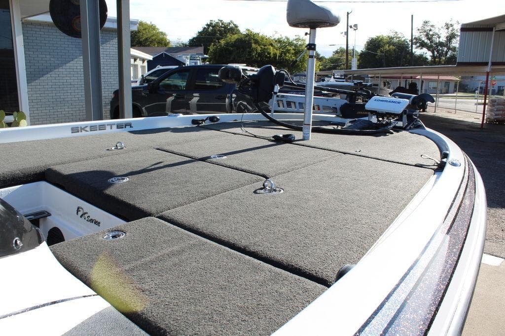 2016 Skeeter FX21 Limited Edition boat with spacious deck and fishing equipment.