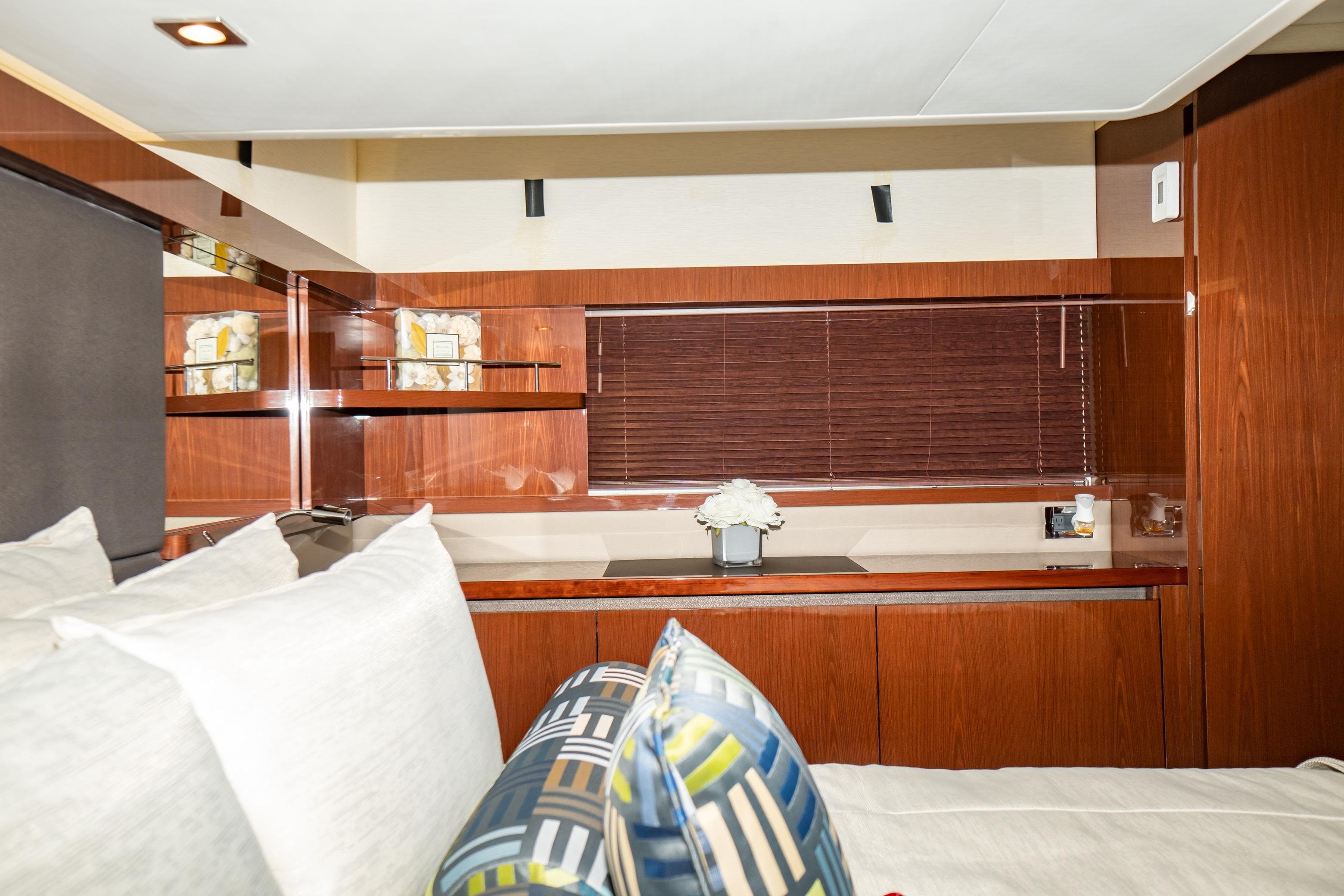 Luxurious interior of 2017 Sea Ray Sundancer 460 yacht with elegant wood finishes.