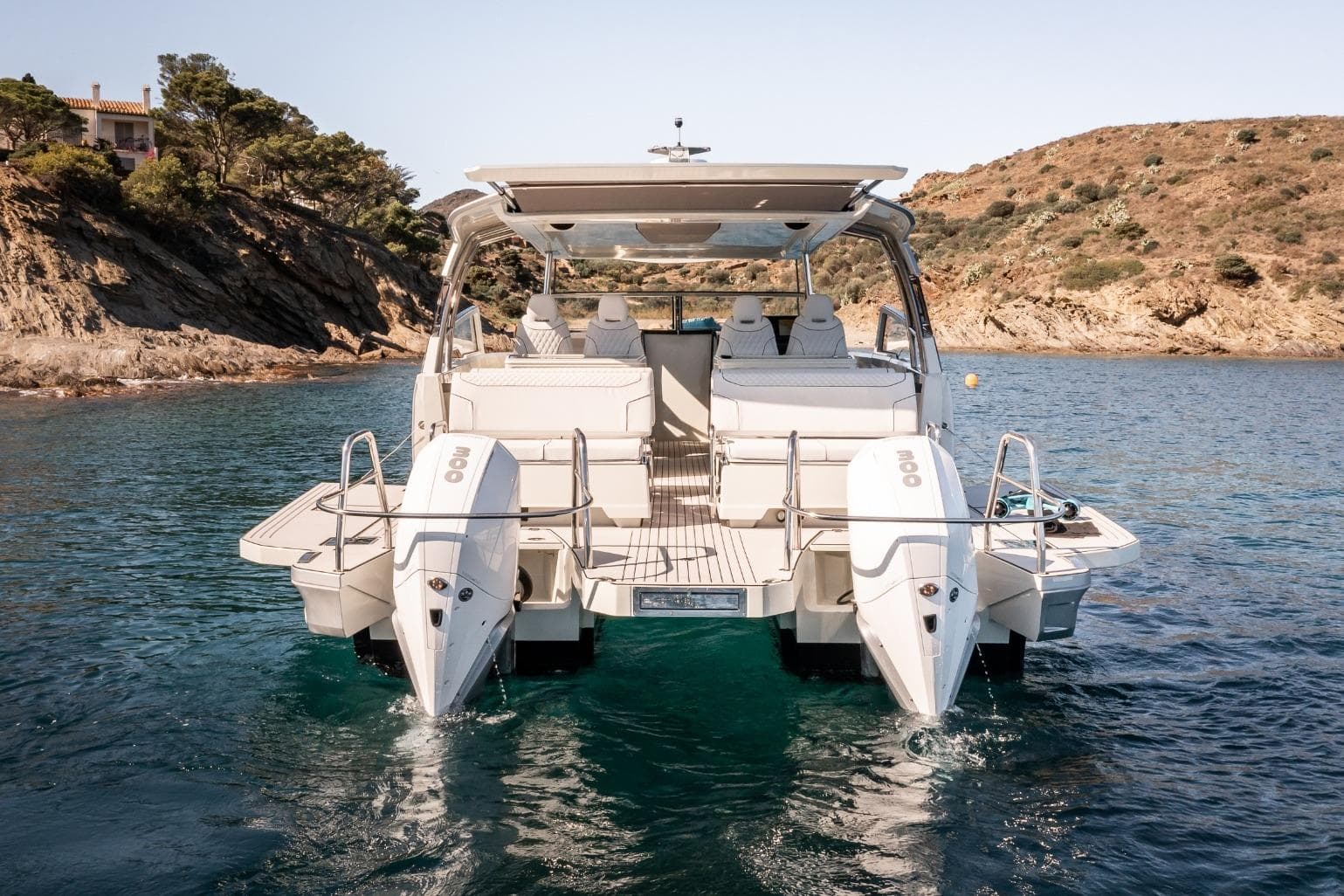 Luxury YOT 36 boat, 2026 model, anchored in scenic coastal waters.