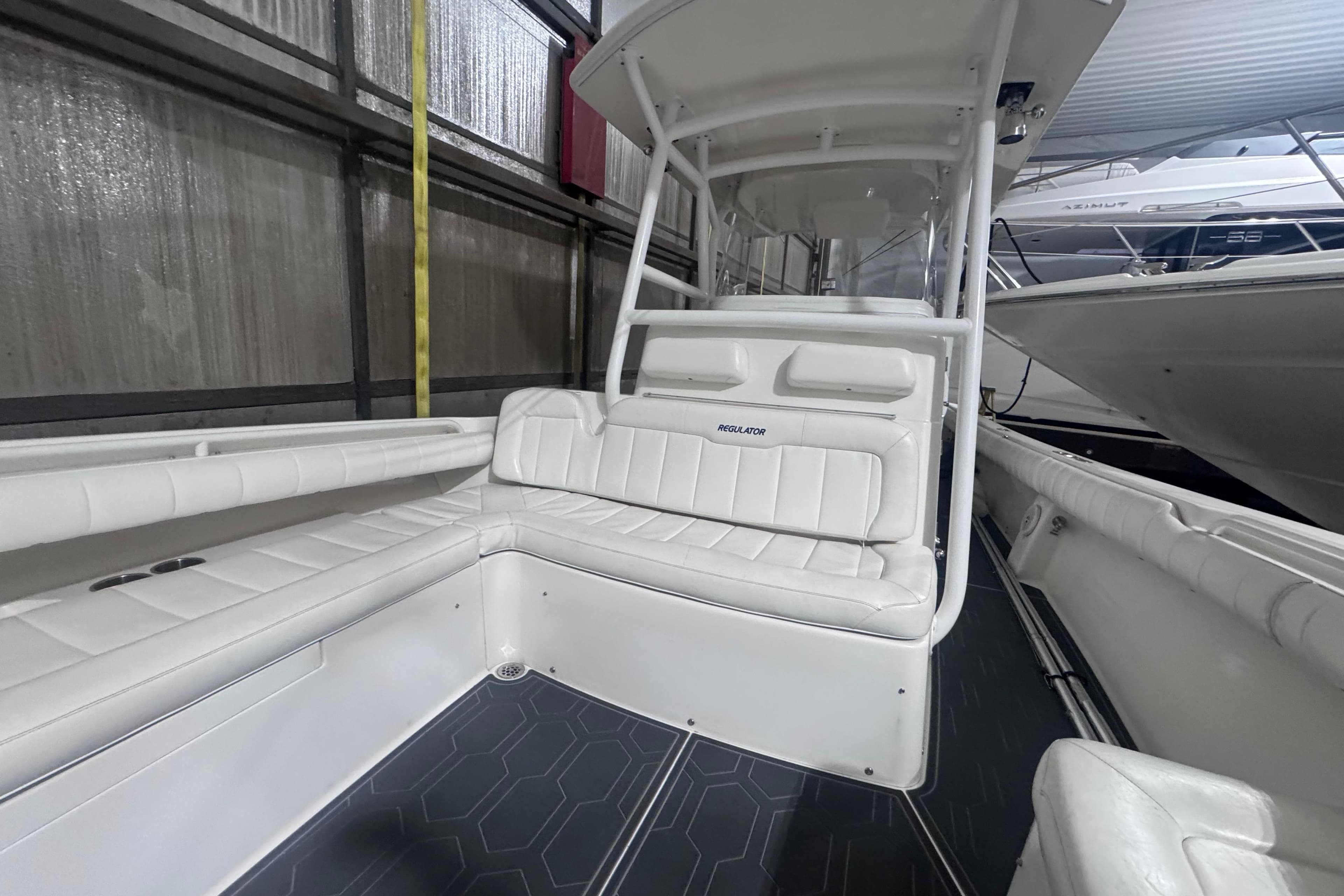 2010 Regulator 34SS boat interior with white seating and modern design.