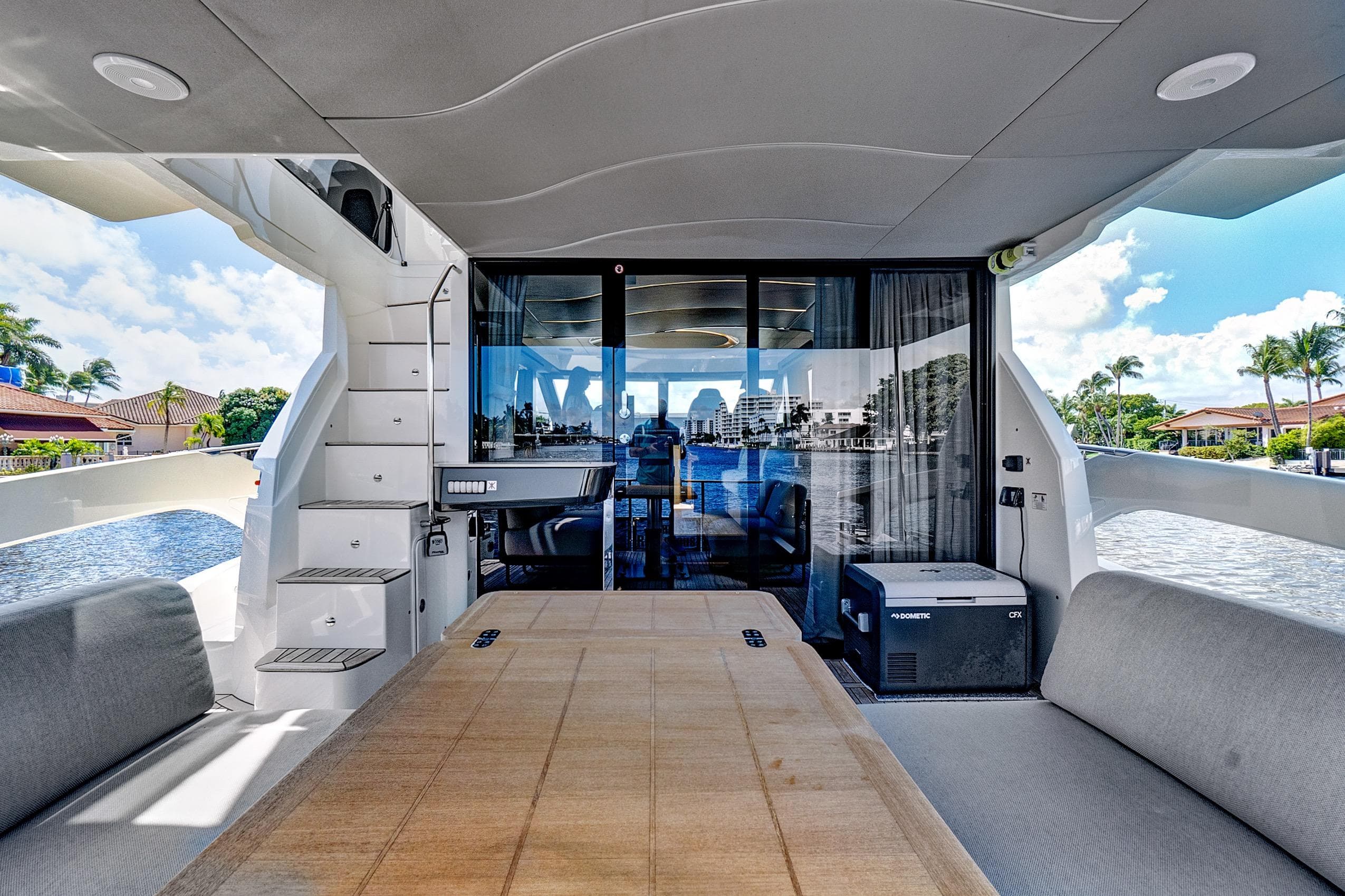 Luxurious 2025 Absolute 52 FLY yacht interior with spacious seating and scenic water views.