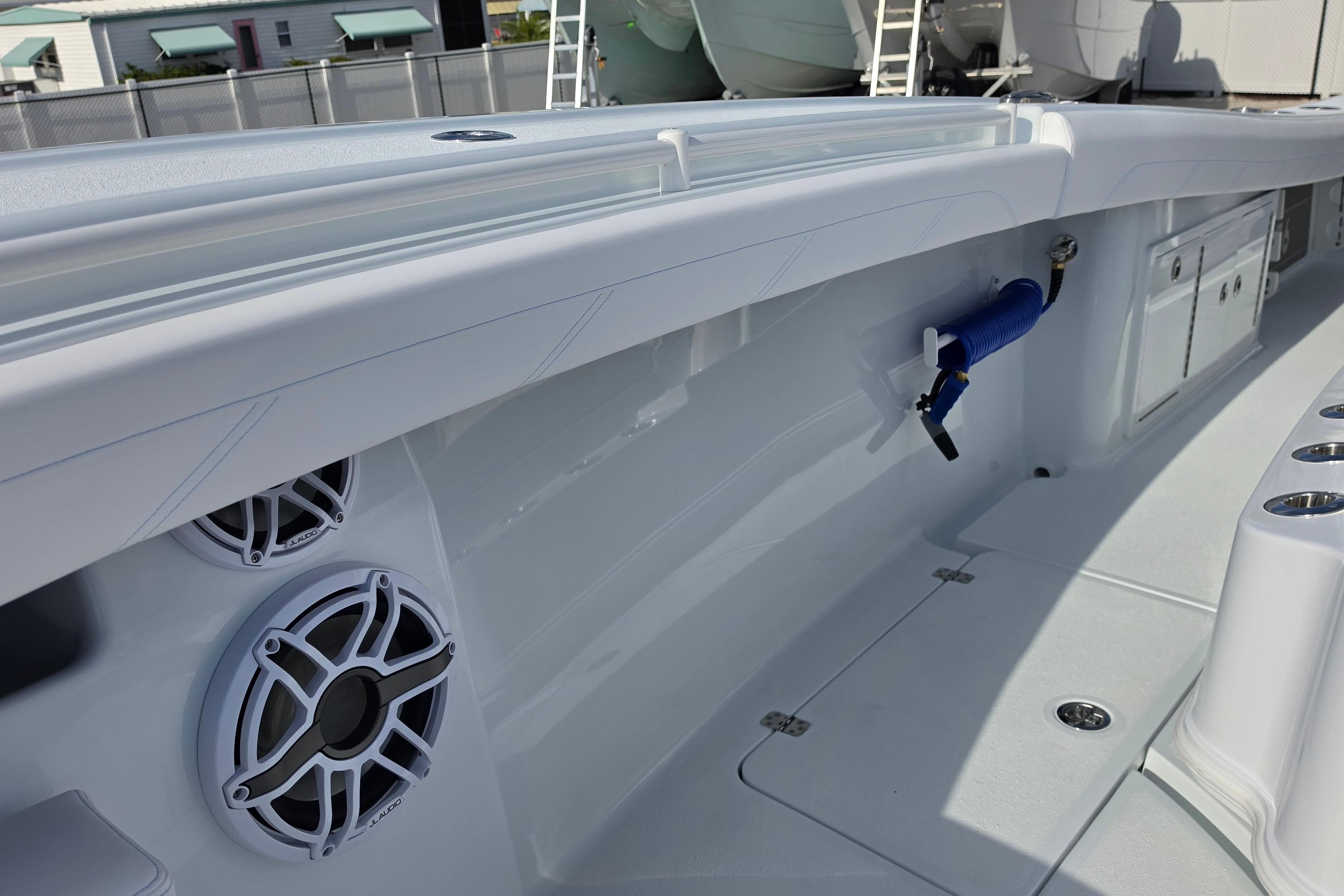 2026 Yellowfin 36 Offshore boat interior with speakers and storage compartments.