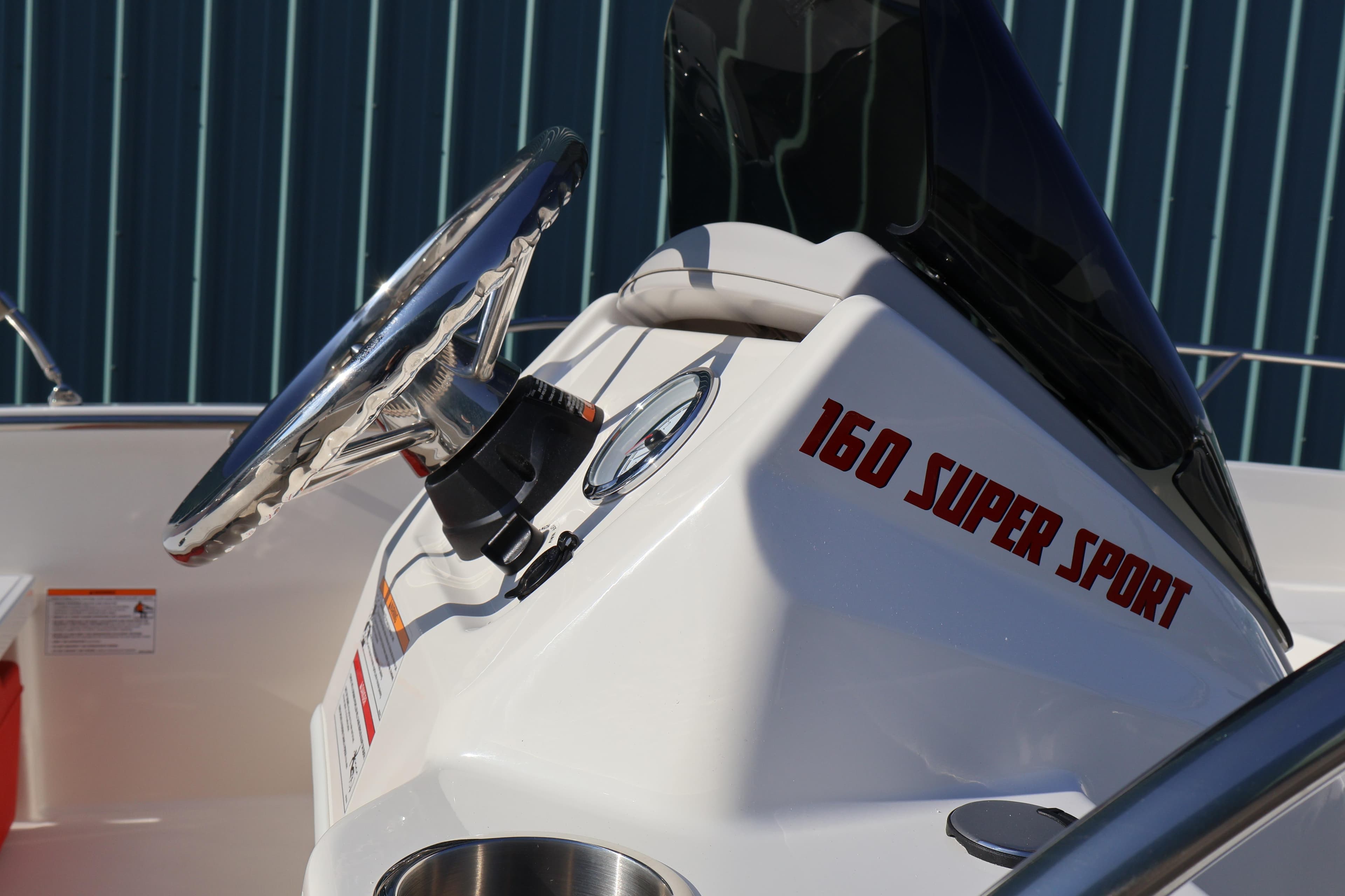 2026 Boston Whaler 160 Super Sport steering console with sleek design and modern features.