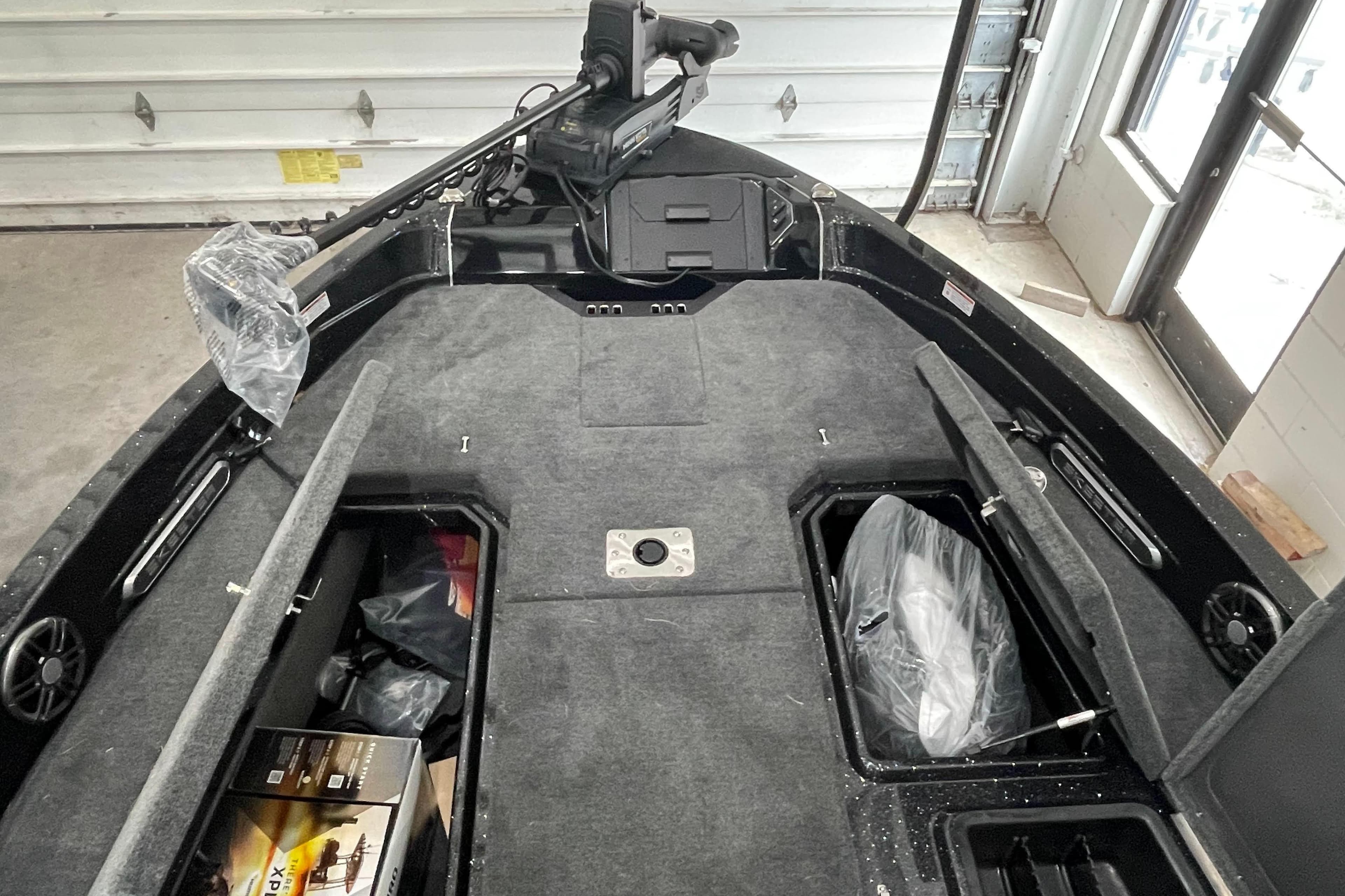 2026 Skeeter WXR2060 F boat interior with storage compartments and equipment.