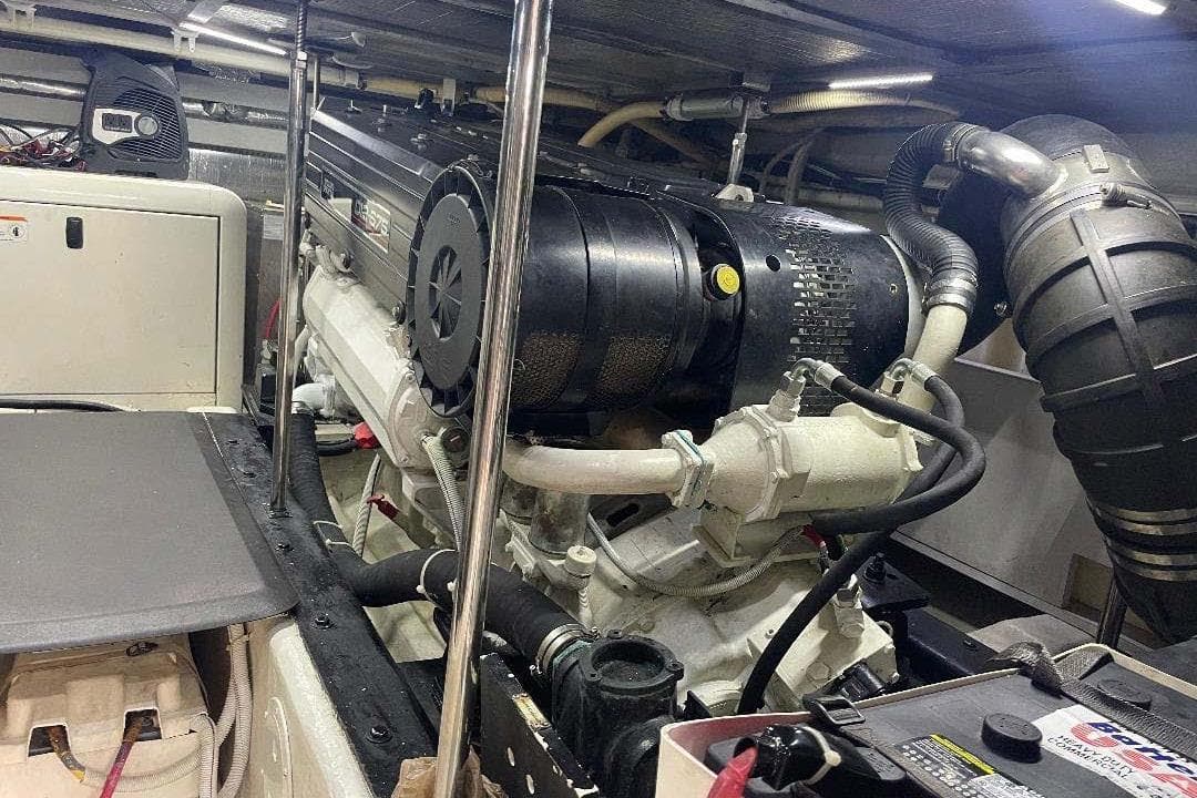 Engine room of 2004 Carver 570 Voyager Pilothouse with visible machinery and components.