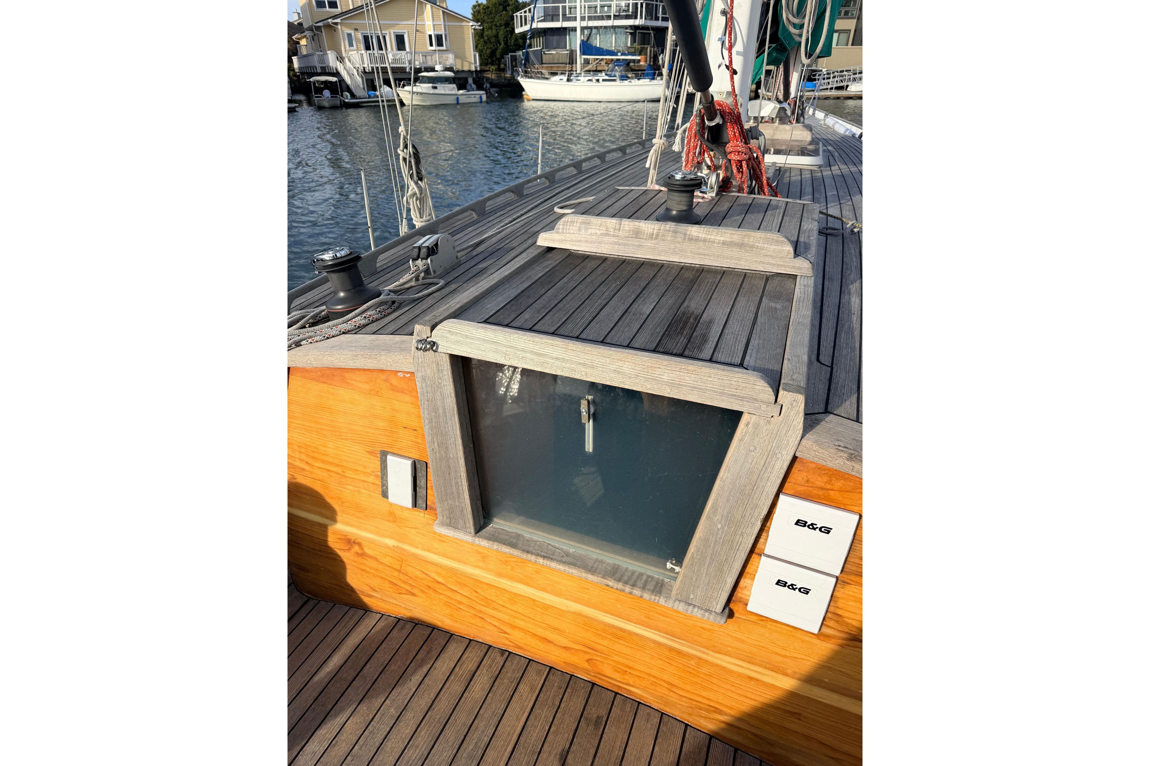 Custom 49' Schooner by Chuck Burns, 2007, featuring wooden deck and cabin details.