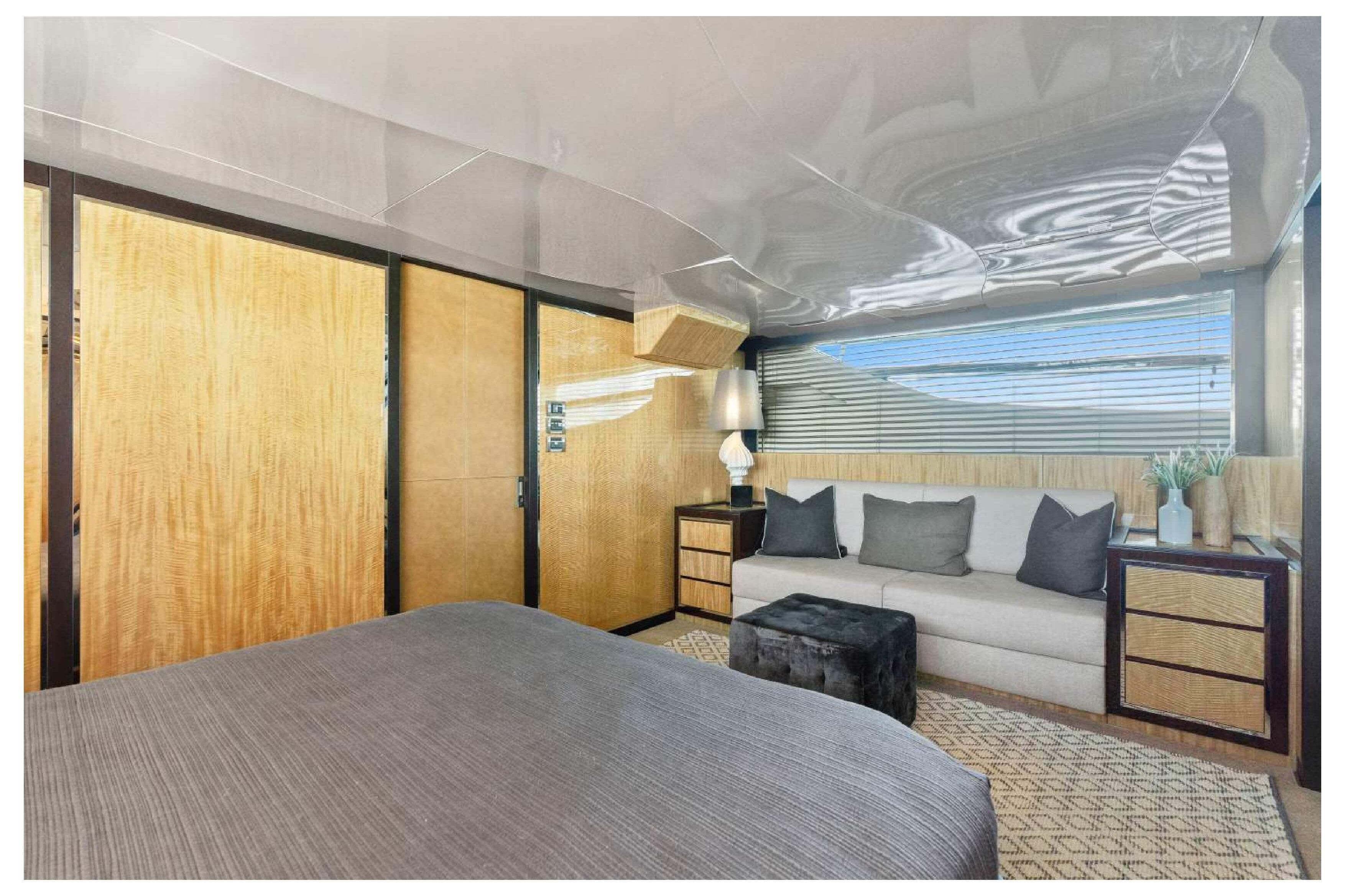 Luxurious interior of 2012 Cheoy Lee 76 Alpha yacht with modern furnishings and elegant decor.