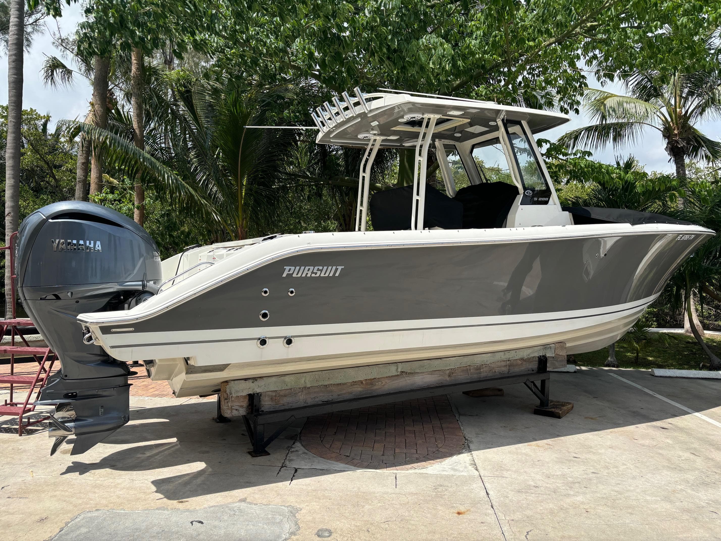 2022 Pursuit S 288 boat on a trailer with Yamaha outboard motor.