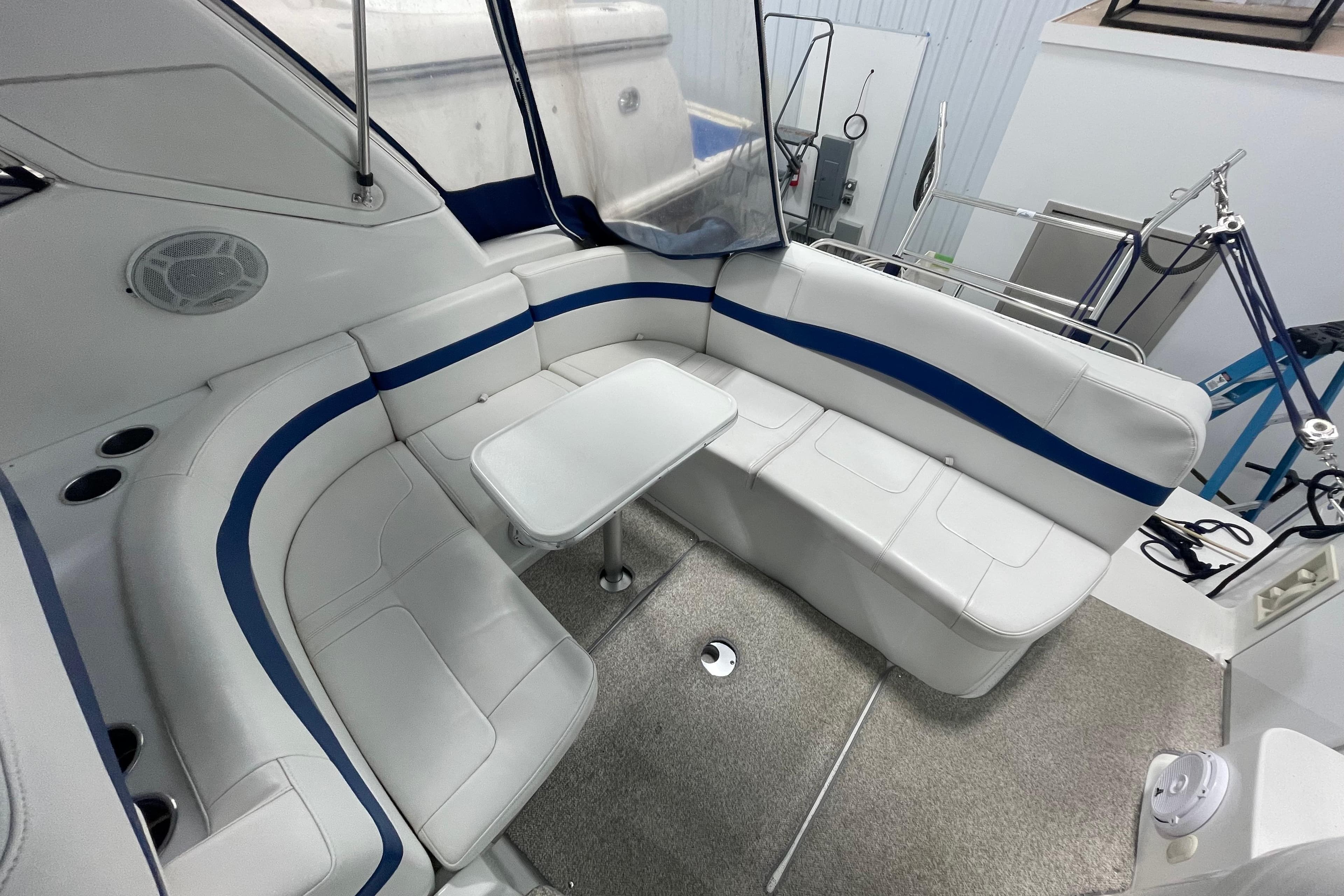 Interior of a 2004 Formula 34 Performance Cruiser with white seating.