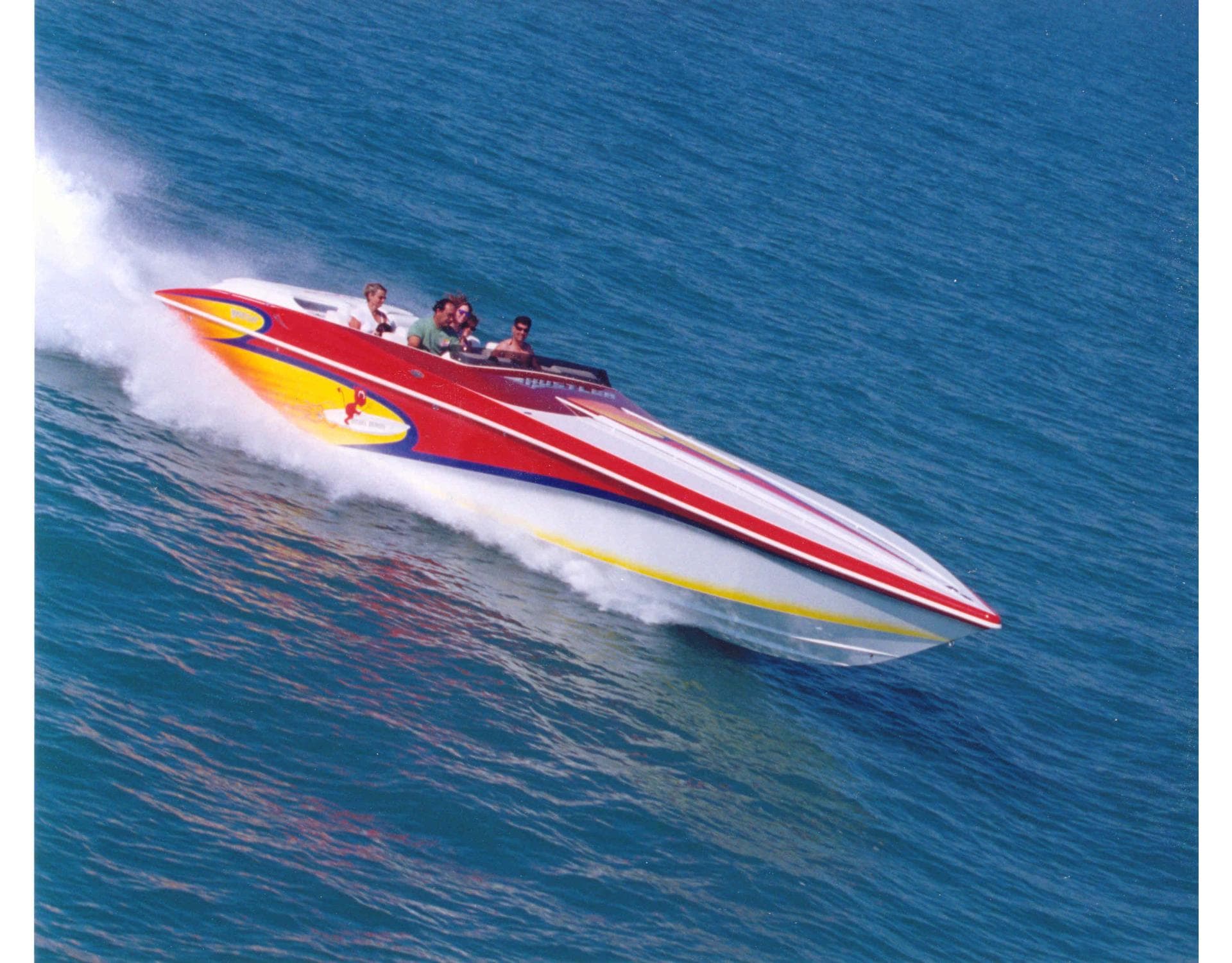 2004 Hustler 388 SLINGSHOT speedboat cruising on open water.