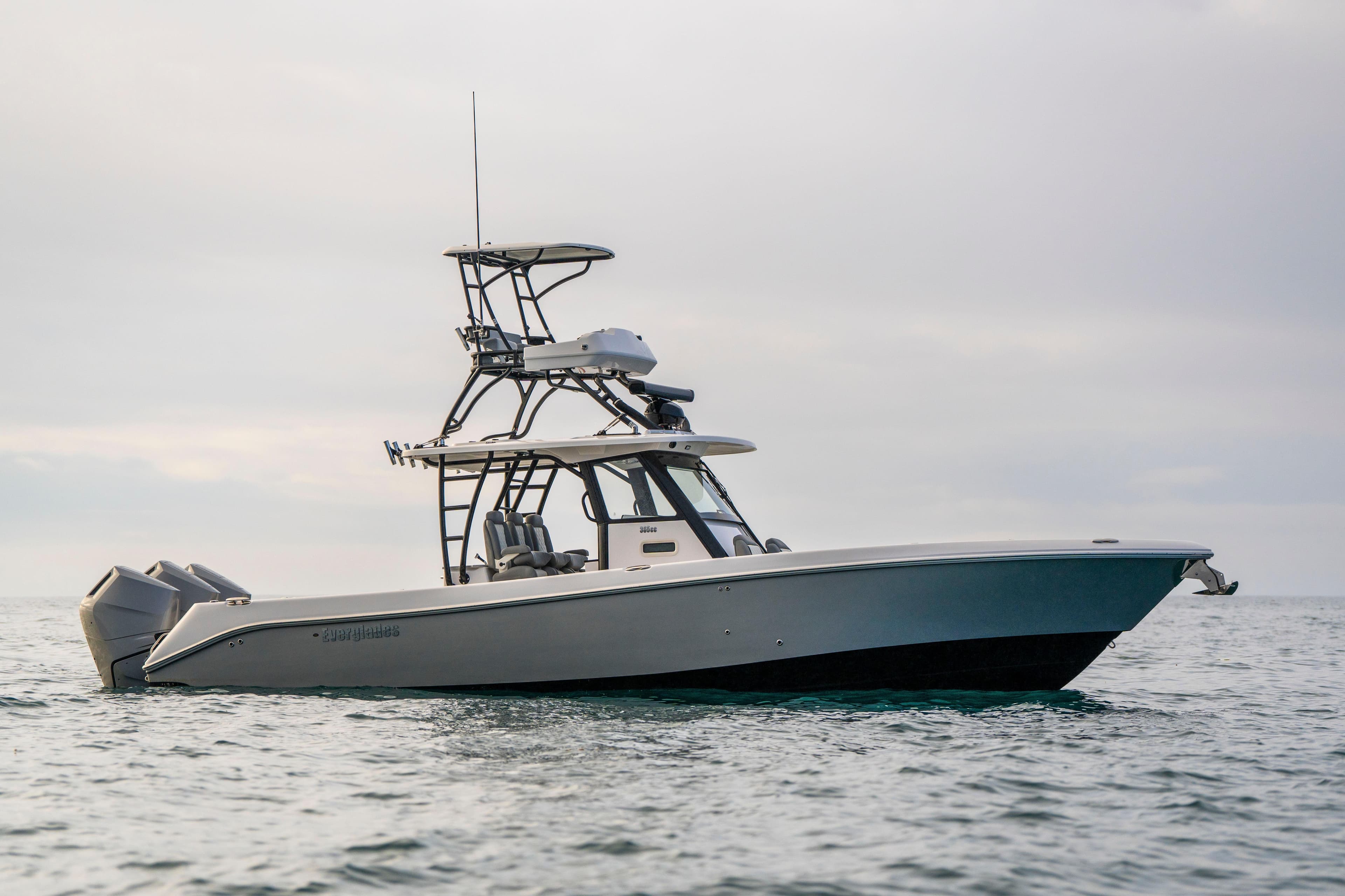 2024 Everglades 365 Center Console boat on calm ocean waters.