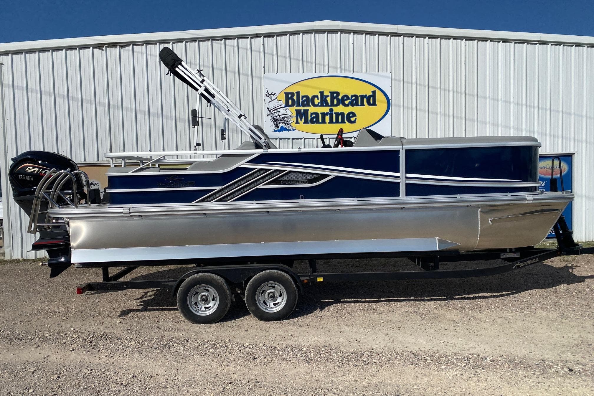 2026 SunCatcher Fusion 322SS pontoon boat at BlackBeard Marine dealership.