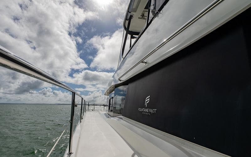 2018 Fountaine Pajot MY44 yacht on open water under cloudy sky.