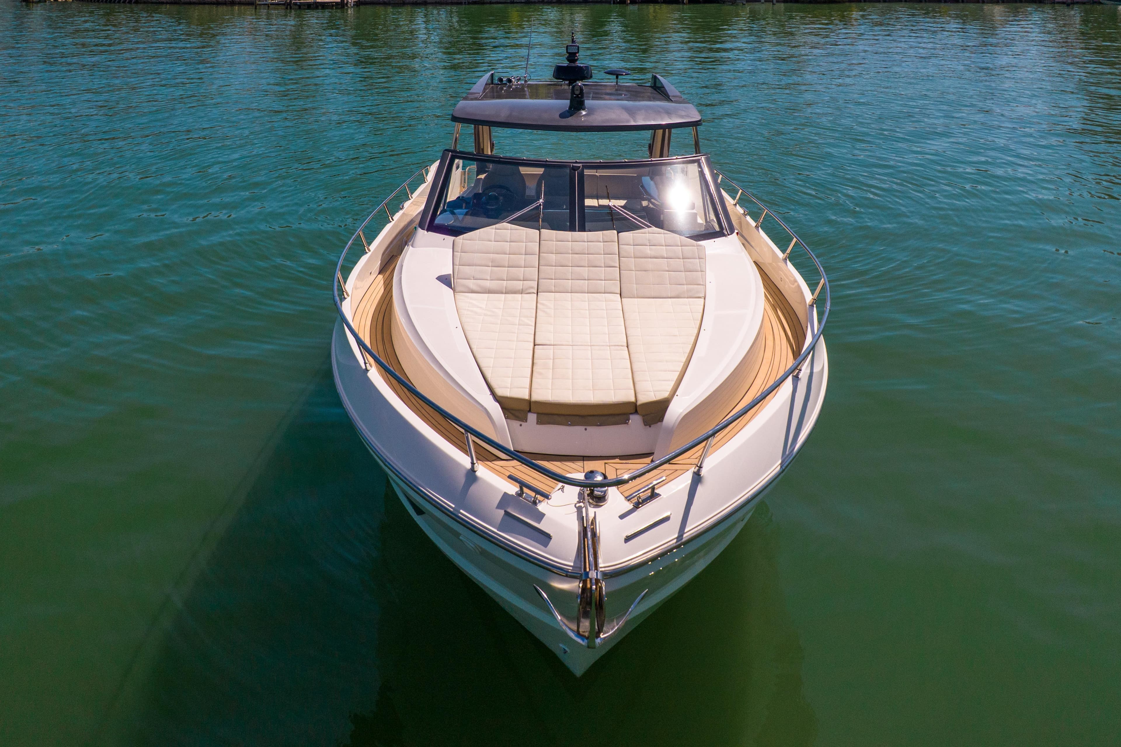 2017 Absolute 40 STL yacht on calm water, showcasing sleek design and spacious deck.