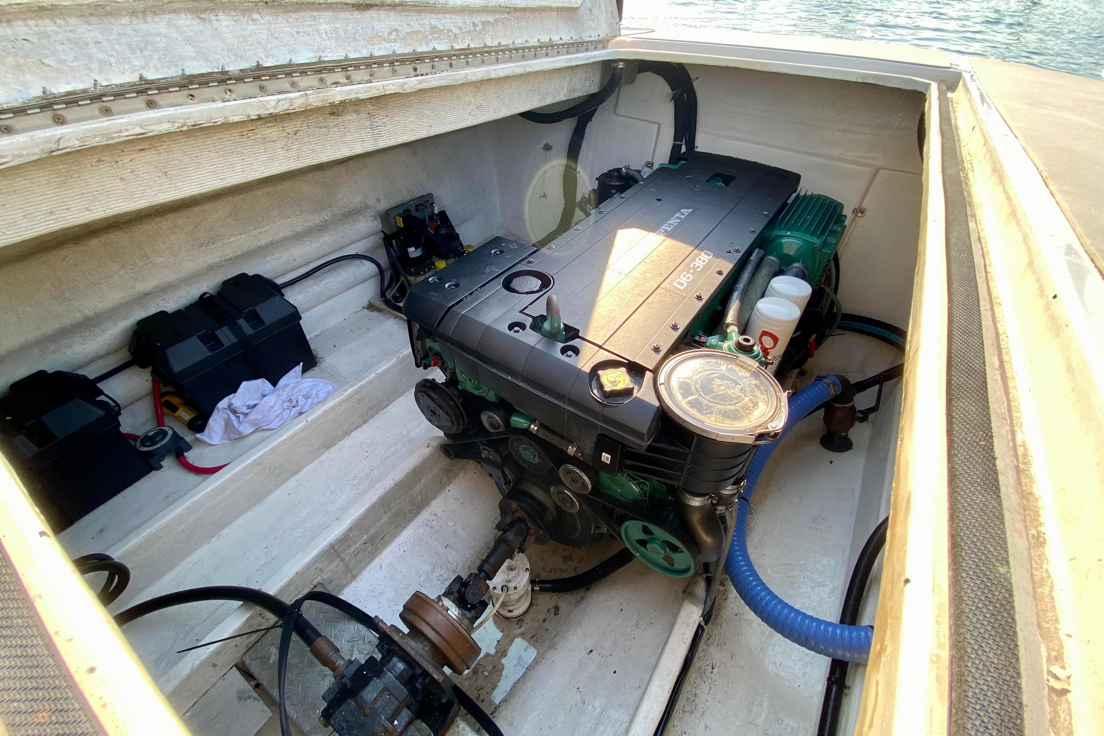 Engine compartment of 2003 Custom O.C. Parasail 28 boat, featuring Volvo Penta engine.