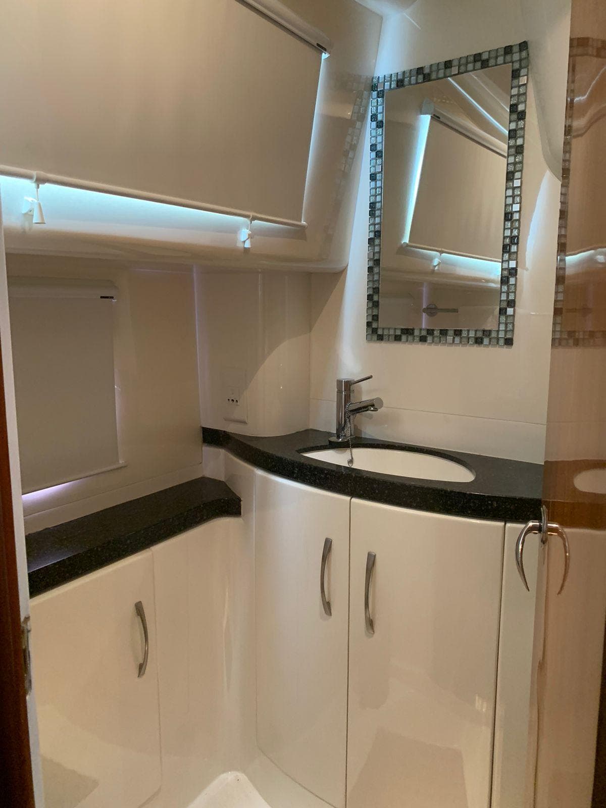 Luxurious bathroom in 2009 Hysucat STEALTH 54 yacht with modern fixtures and elegant design.