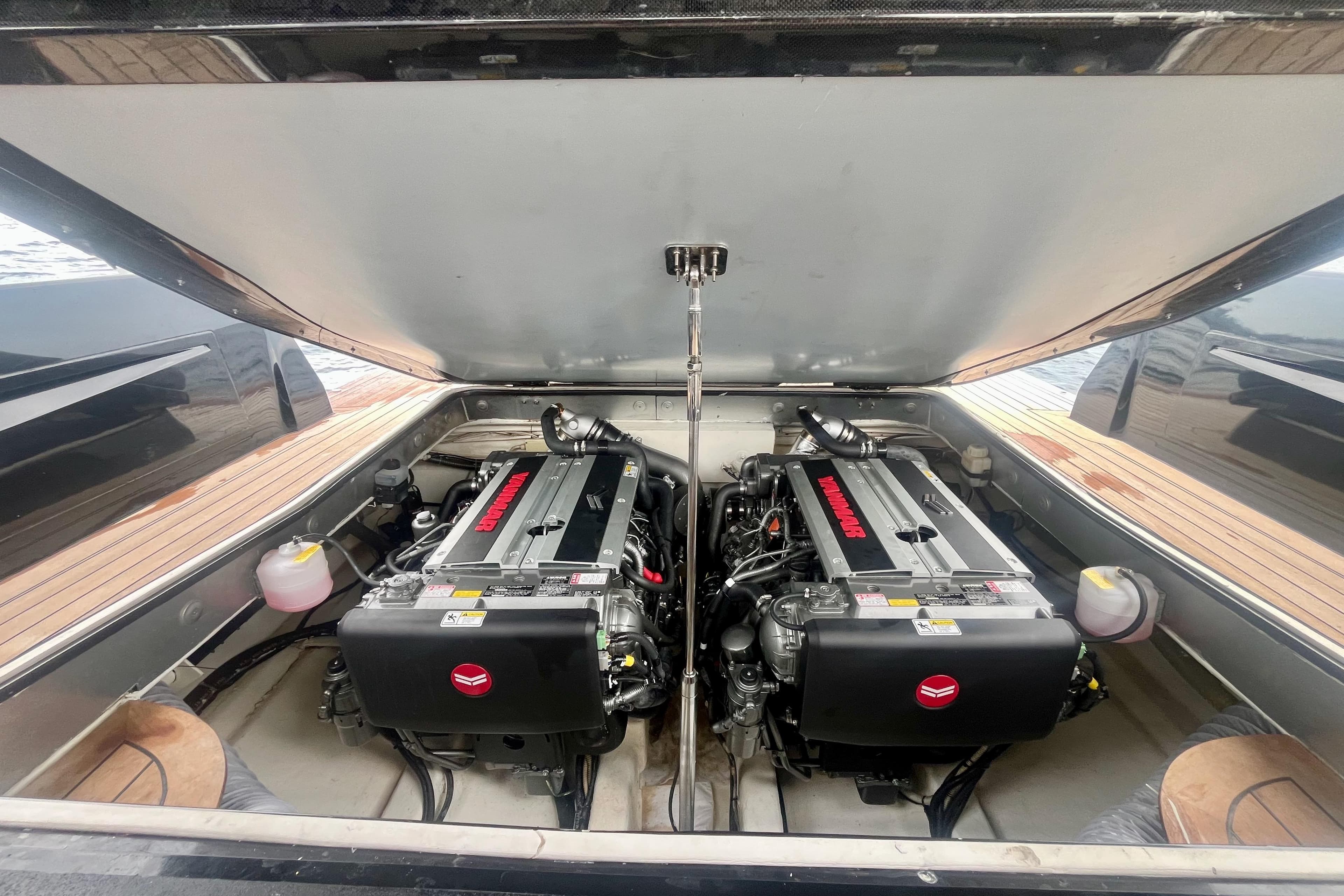 Engine compartment of a 2011 Maori 50 T-Top boat, featuring dual Yanmar engines.