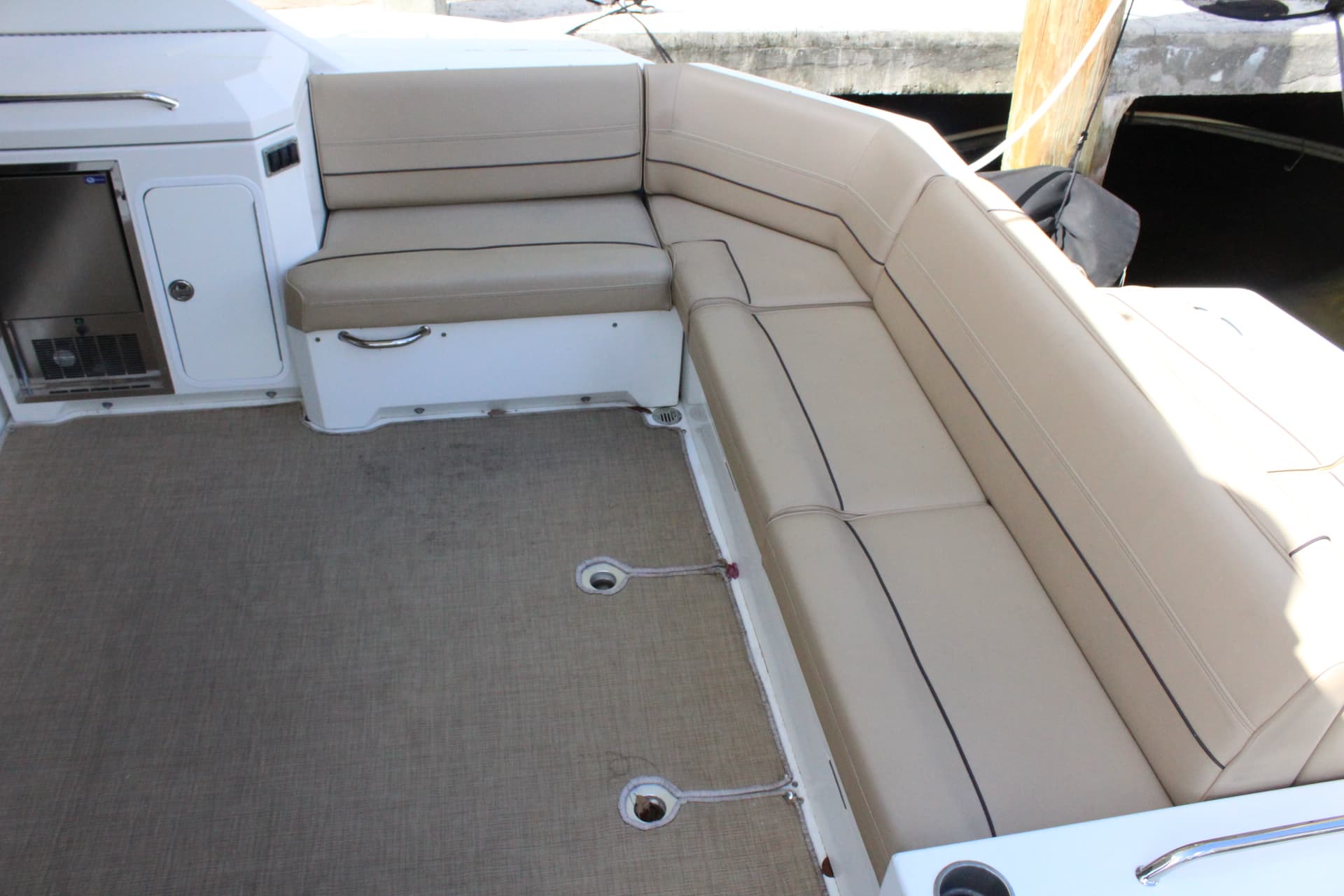 Interior of 2014 Cruisers Yachts 45 Cantius with beige seating.