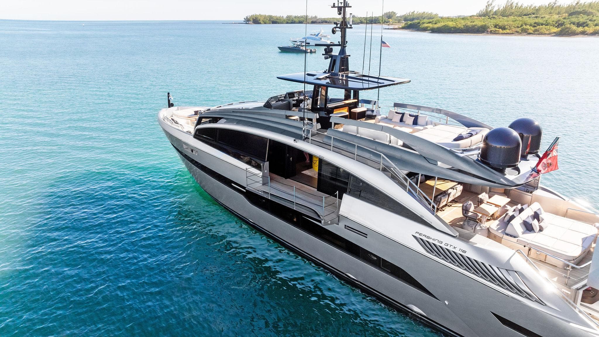 Luxury Pershing GTX 116 yacht cruising in clear blue waters, 2023 model.